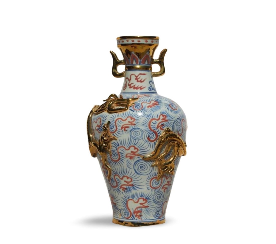 A Porcelain Vase: A Porcelain Vase. Dimension: 8.5" x 15.75".