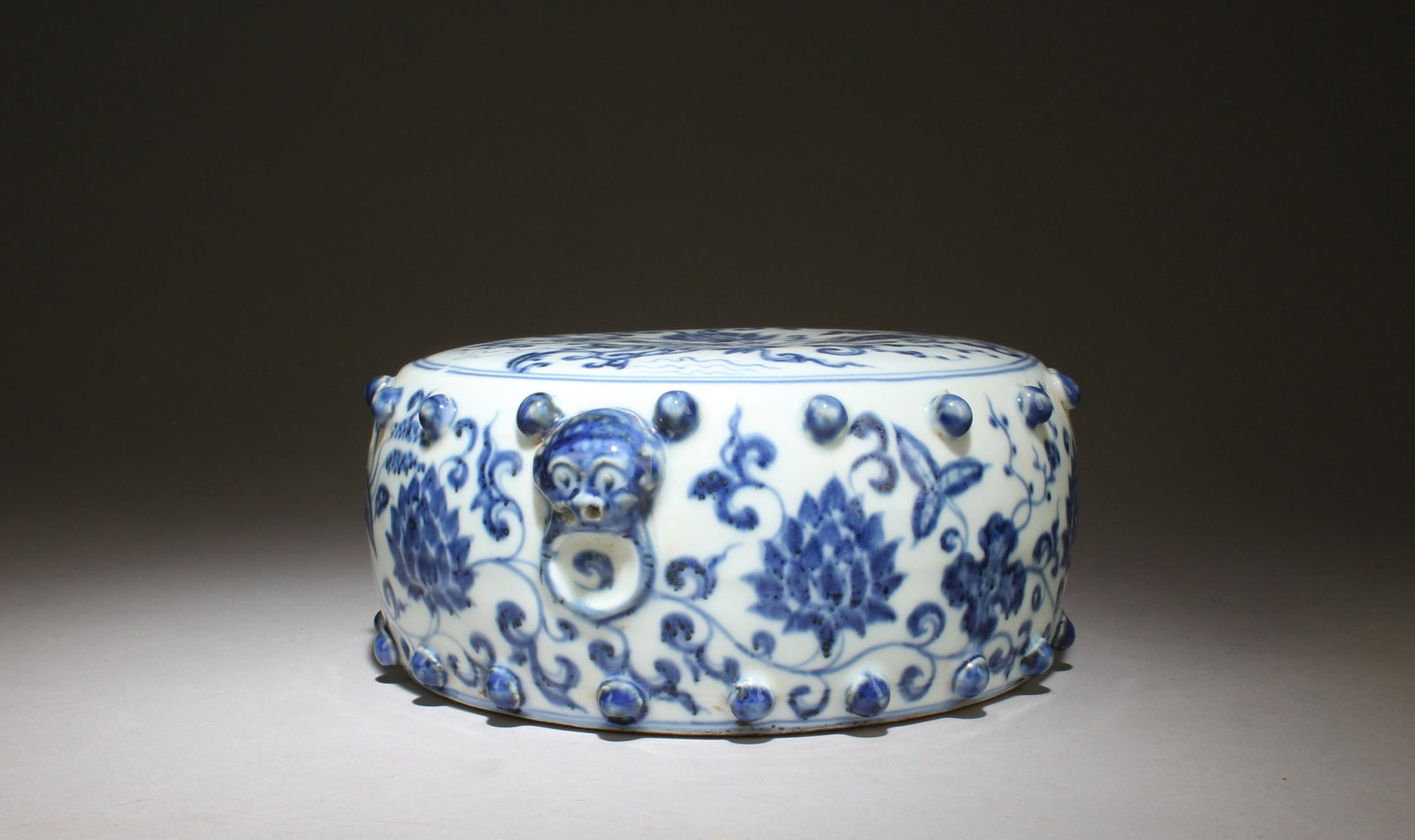 A Blue and White Porcelain Armrest: A Blue and White Porcelain Armrest. Dimensions: 8.25'' x 3.25''
