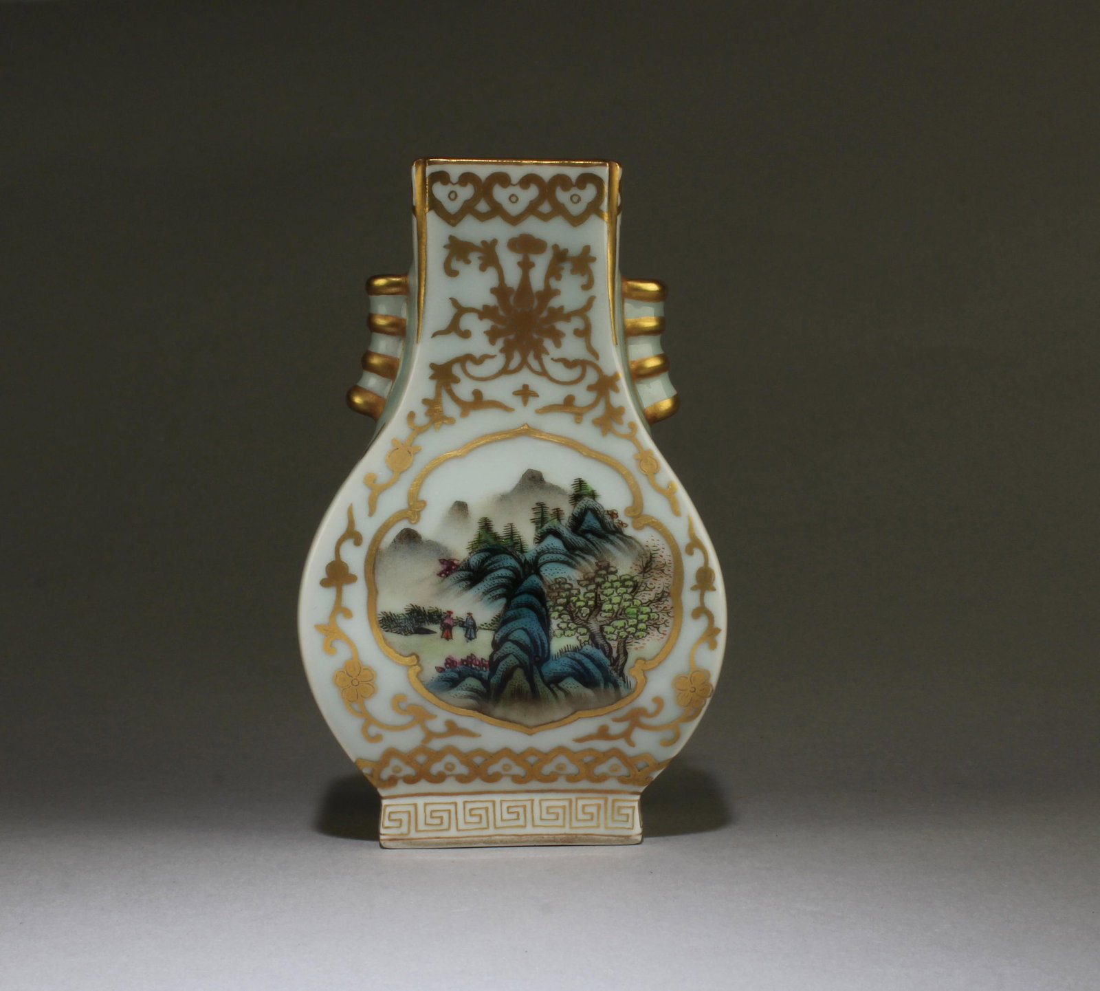 Chinese Porcelain Vase: Chinese Porcelain Vase, flanked by twin cylindrical-looped handles. 'QianLong' mark. Height: 6.25"