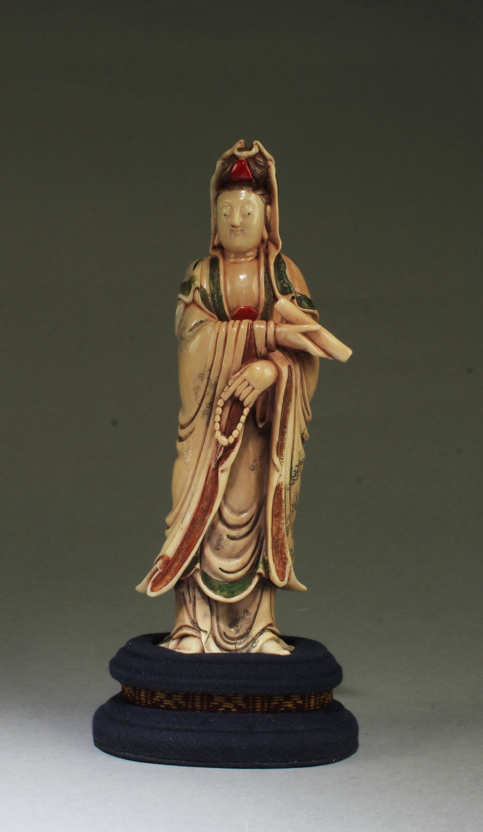 Chinese Carved Soapstone Guanyin Statue: Chinese Carved Soapstone Guanyin Statue. Comes fitted with a base. Height: 6.75" (without stand)