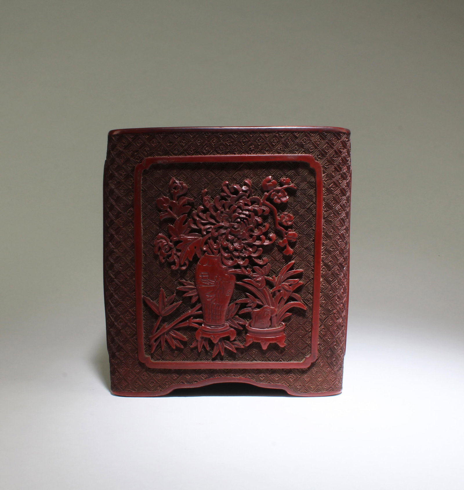 Chinese Square-shaped Cinnabar Lacquer Brushpot: Chinese Square-shaped Cinnabar Lacquer Brushpot. 'QianLong' mark at base. Height: 7"