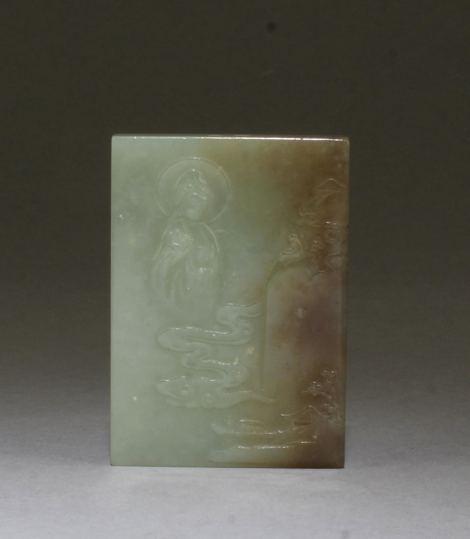 A Carved Jade Pendant: A Carved Jade Pendant. Height: 2.75"