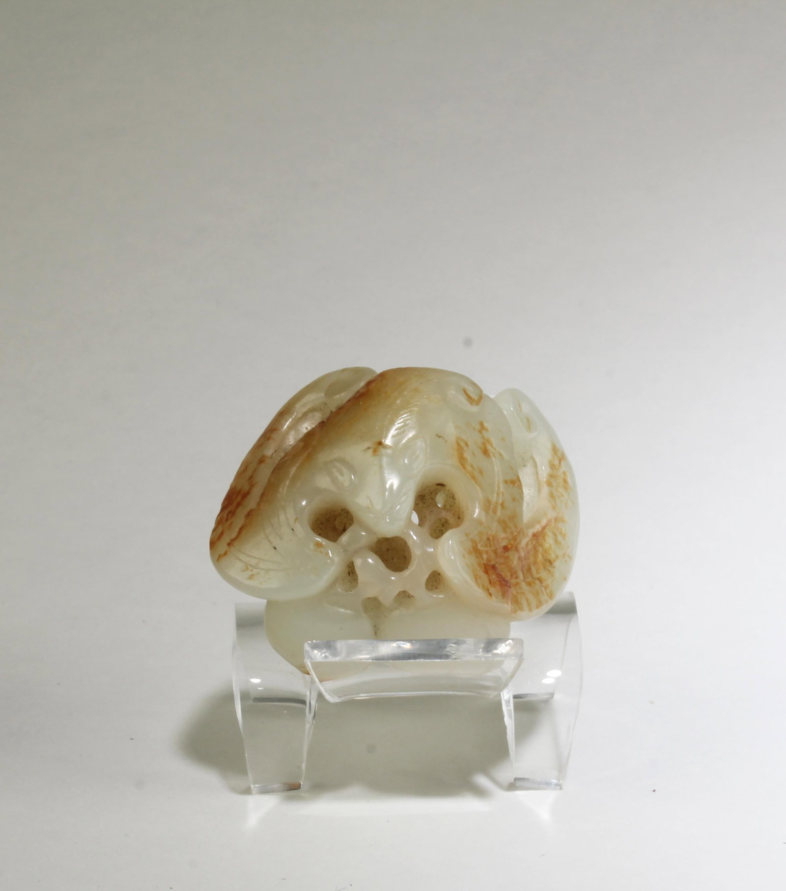 A Hetian Jade Ornament: A Hetian Jade Ornament. Length: 2"