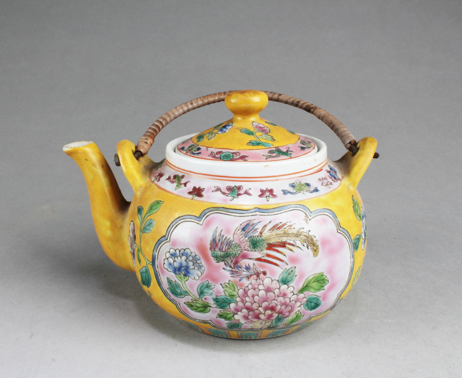 Chinese Famille Jaune Porcelain Teapot: Chinese Famille Jaune Porcelain Teapot. Length: 7.5"