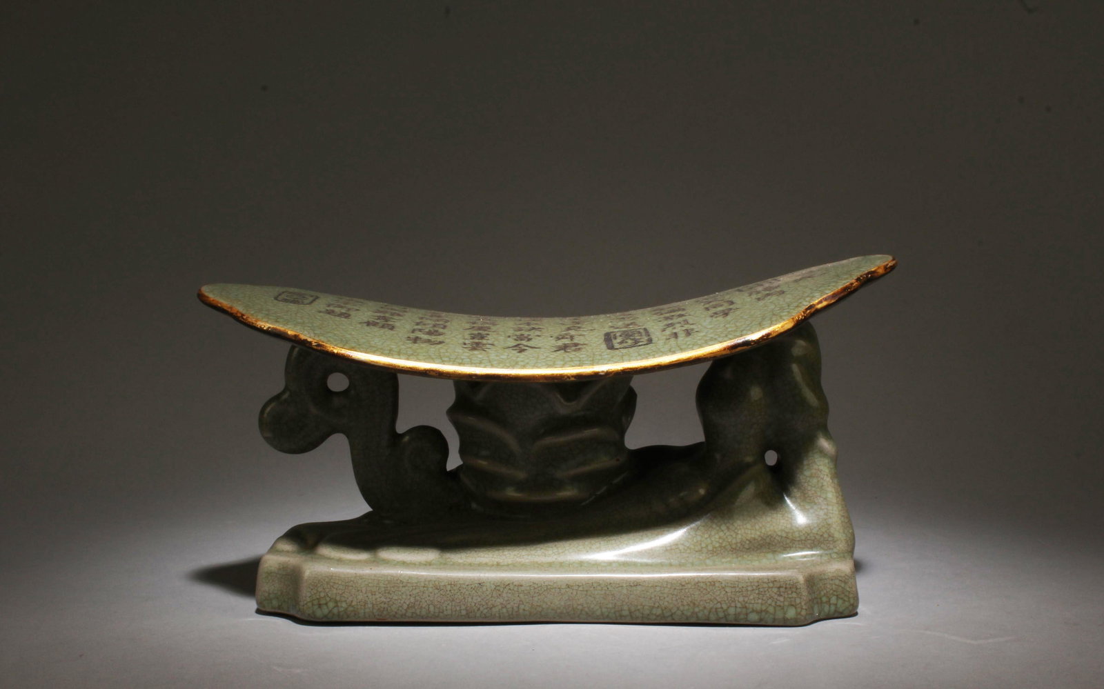 A Ruyao Pillow: A Ruyao Pillow. Dimensions: 4.75" x 9.6" x 4.9".