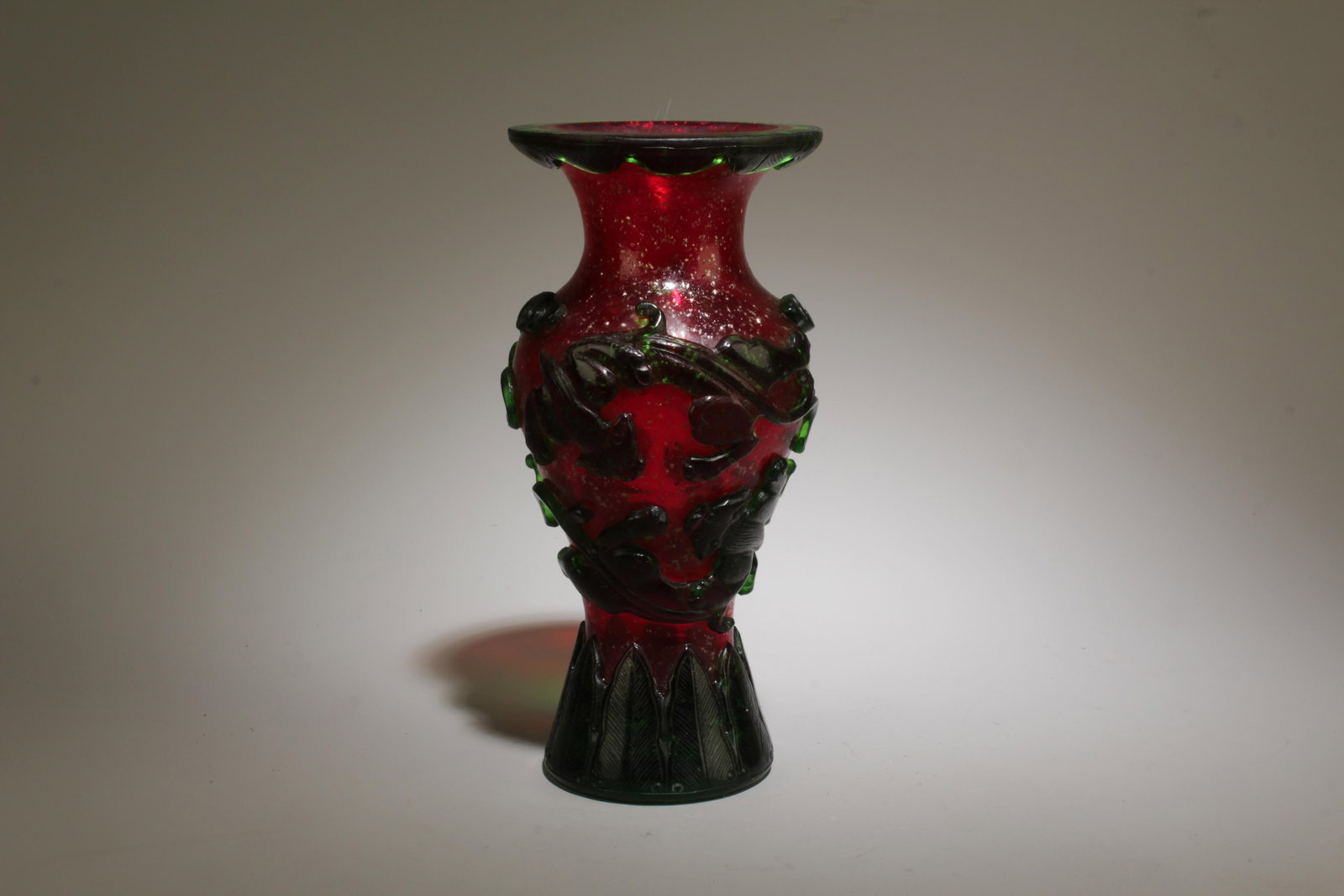 A Pekking Glass Vase: A Pekking Glass Vase. Dimension: 3.3" x 6.5".