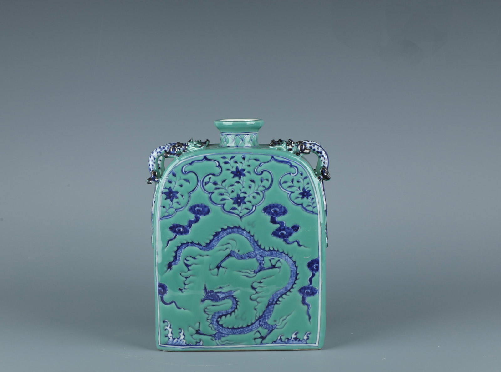 A Blue and Green Vase with Dragon Motif: A Blue and Green Vase with Dragon Motif. Dimensions: 8.7" x 7" x 2.8".