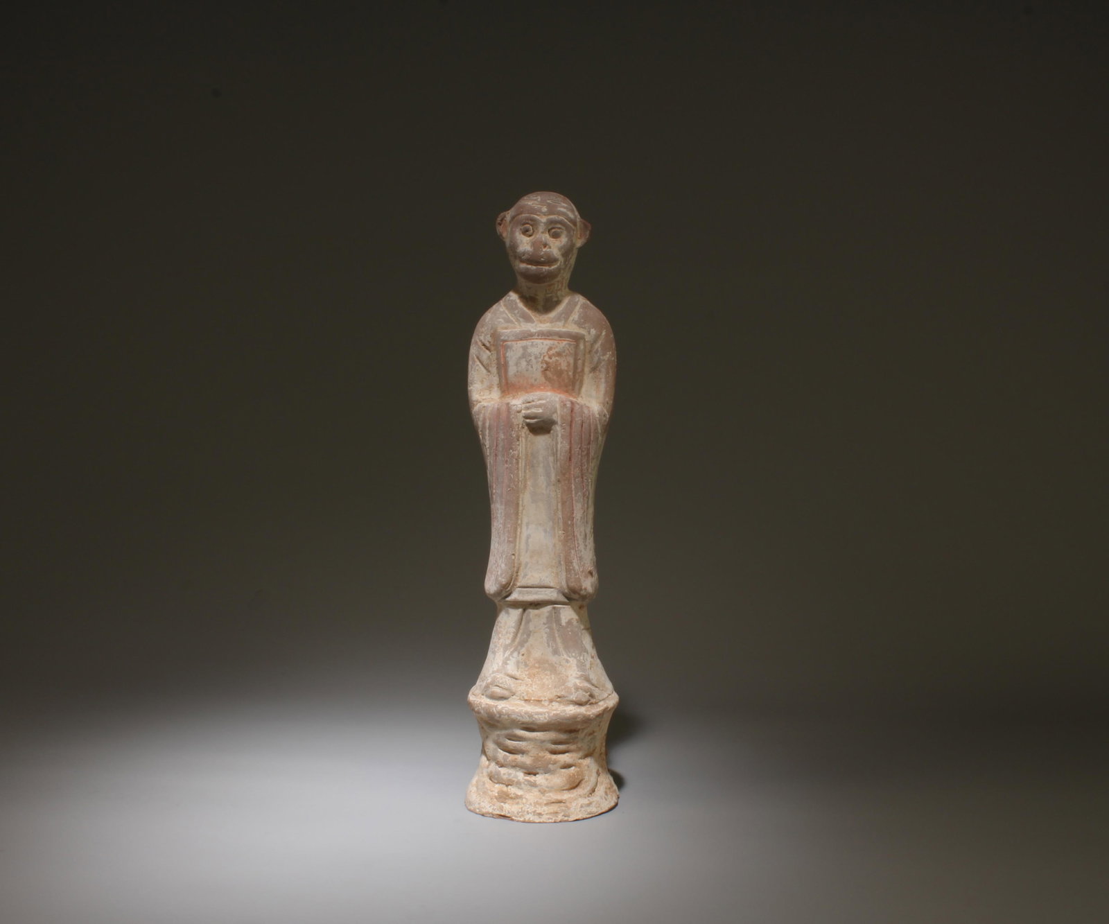 An Old Pottery Figurine: An Old Pottery Figurine. Height: 11.5"