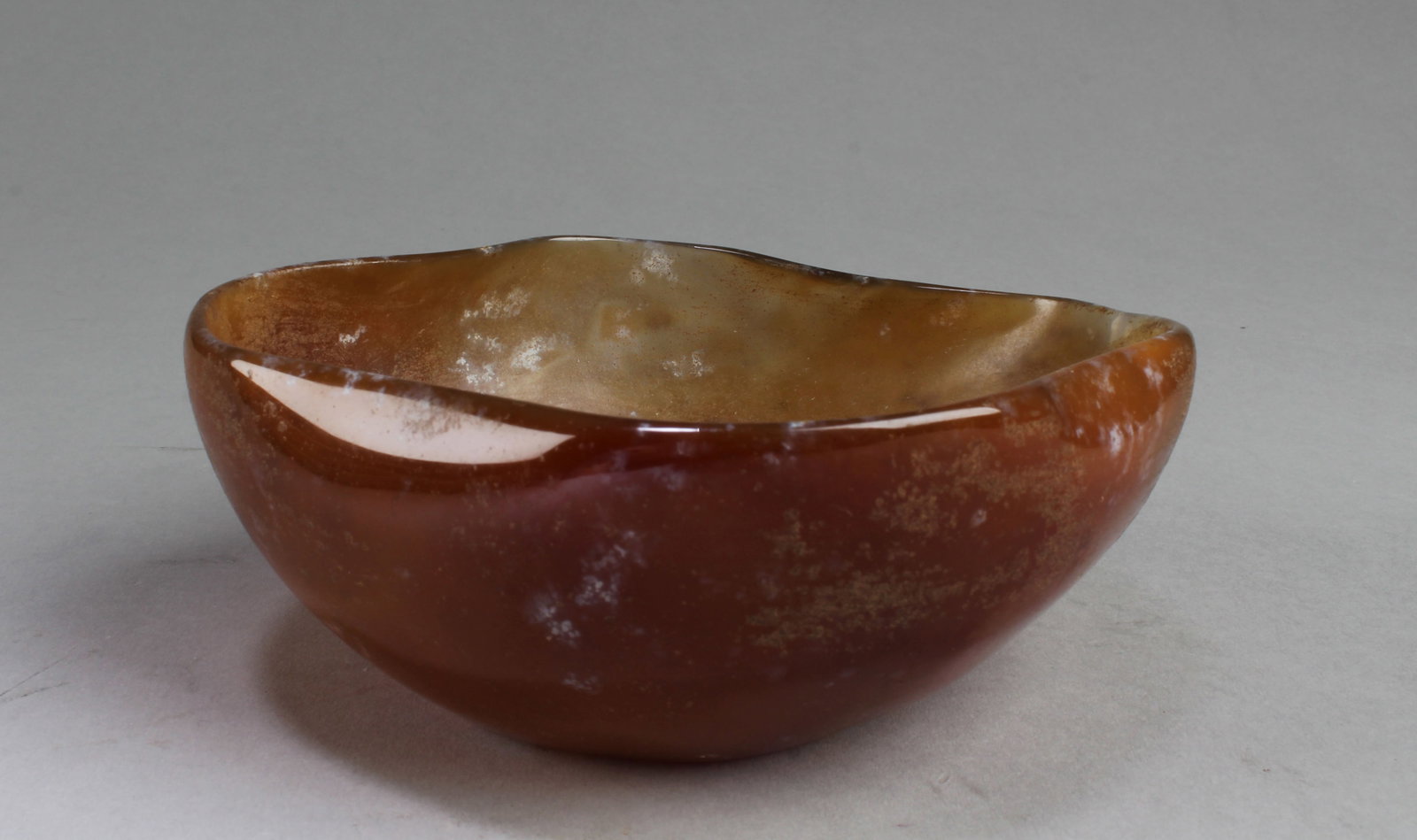 An Agate Bowl: An Agate Bowl. A six character mark is imprinted at the base. Length: 5"