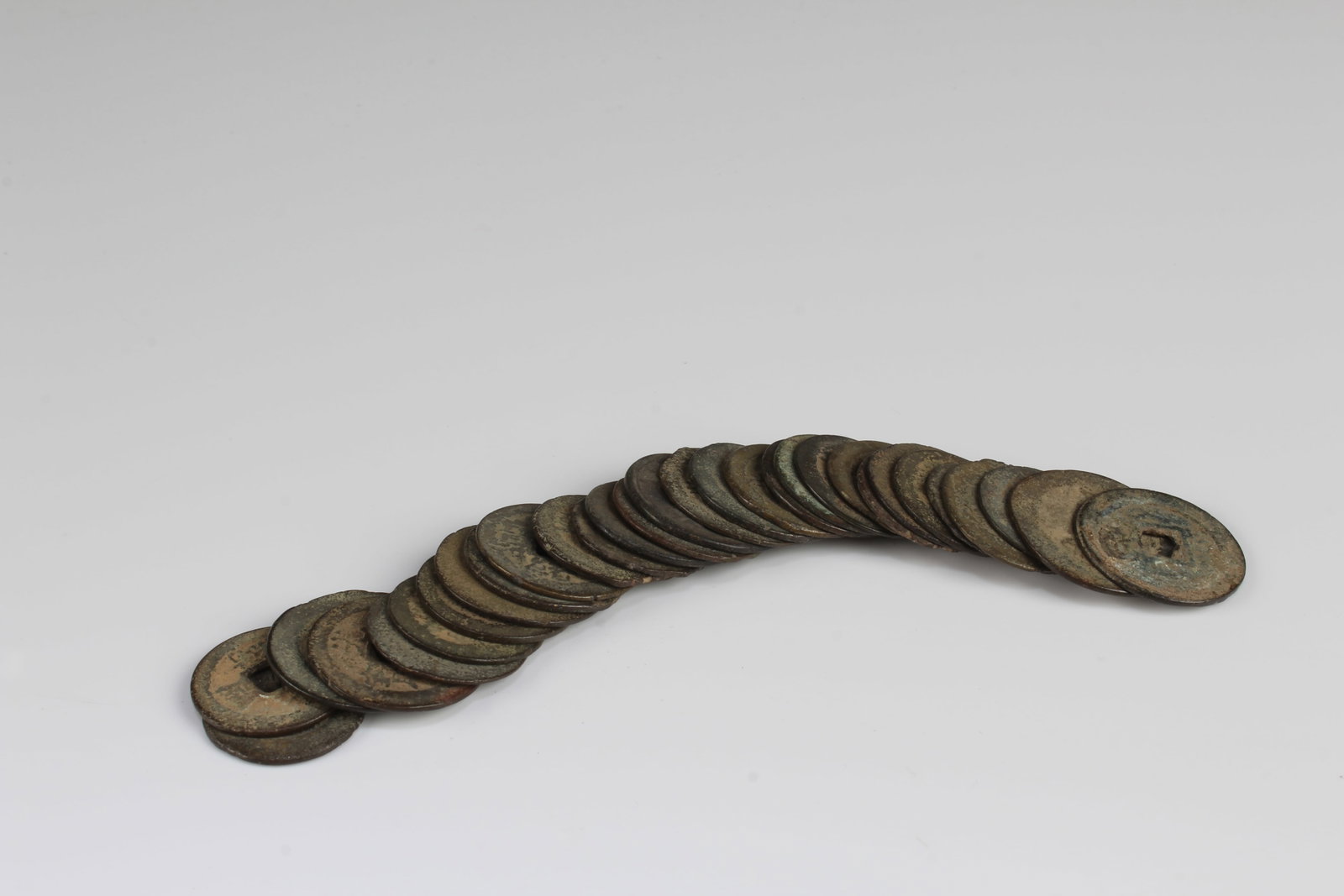 A Group of Chinese Coins: A Group of Chinese Coins. Diameter: 0.75"