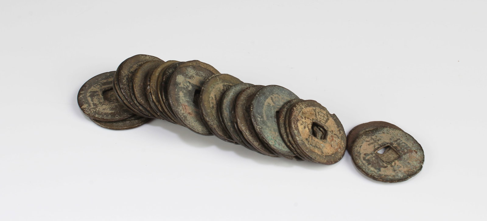A Group of Chinese Coins: A Group of Chinese Coins. Diameter: 0.75"