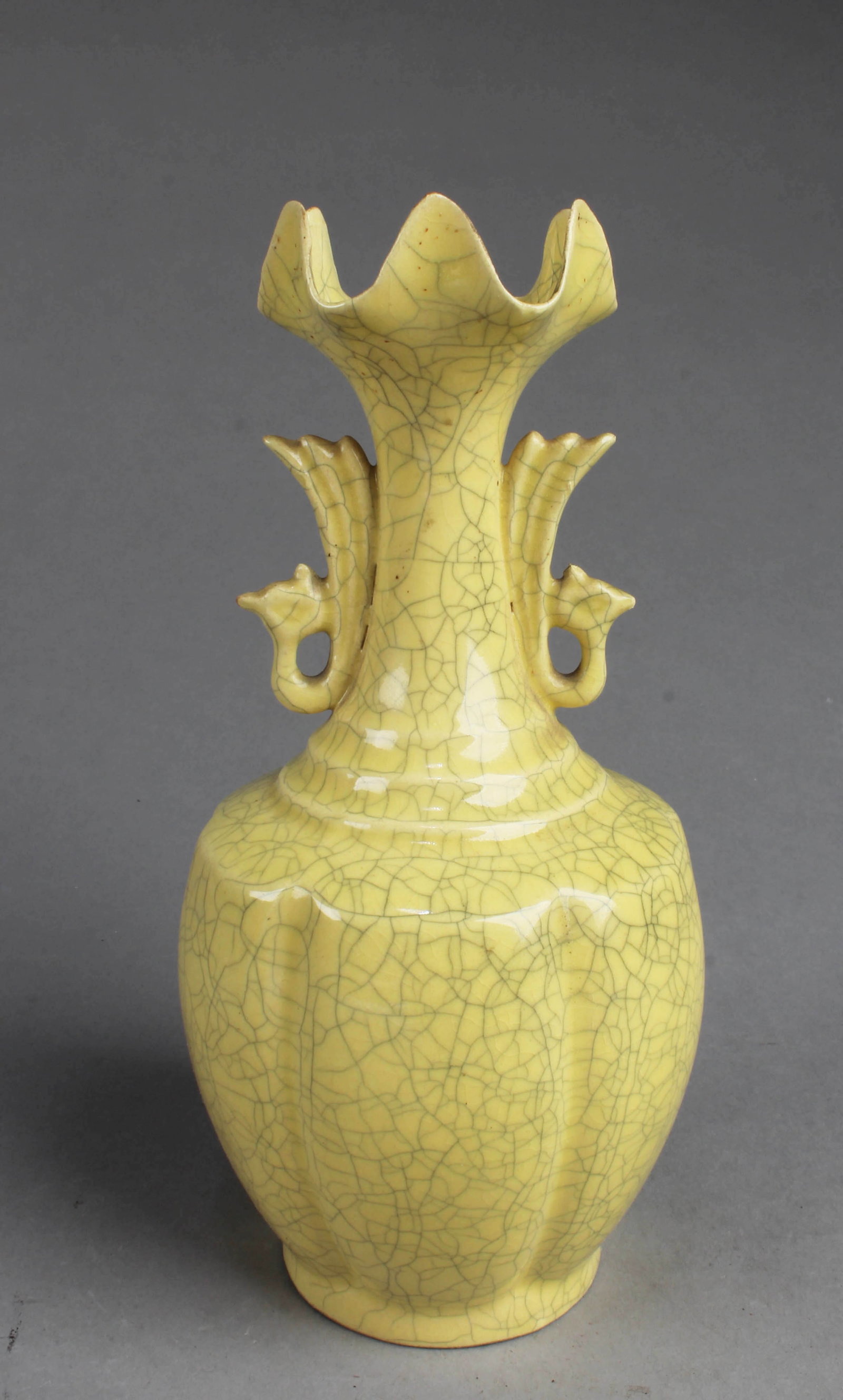 Chinese Famille Jaune Porcelain Vase: Chinese Famille Jaune Porcelain Vase. A mark is imprinted at the base. Height: 7"
