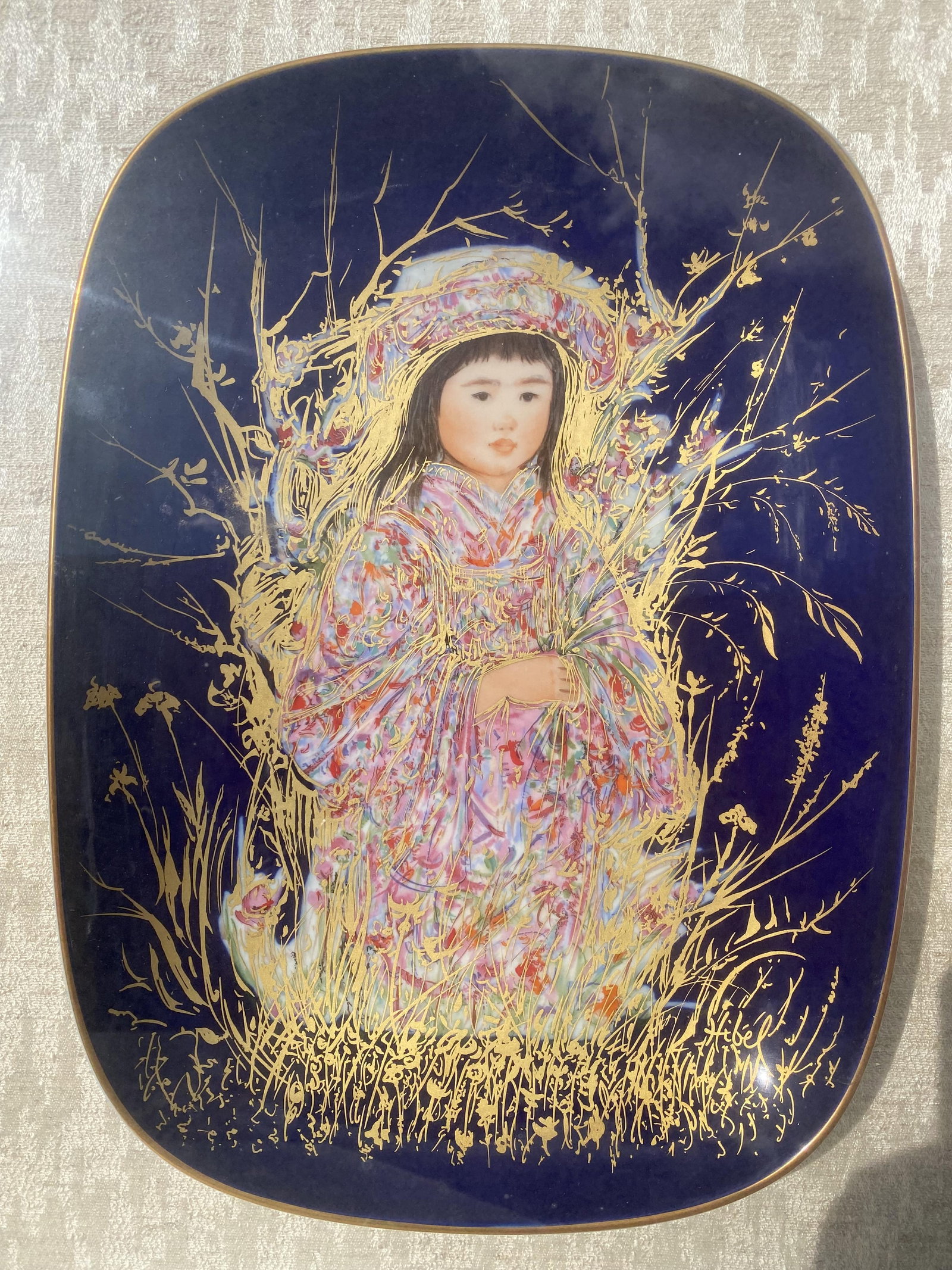 Limited Edition Arte Ovale: Cobalt Blue "Takara" b: Limited Edition Arte Ovale: Cobalt Blue "Takara" by Edna Hibel. Framed. Framed Dimensions: 23''x19''