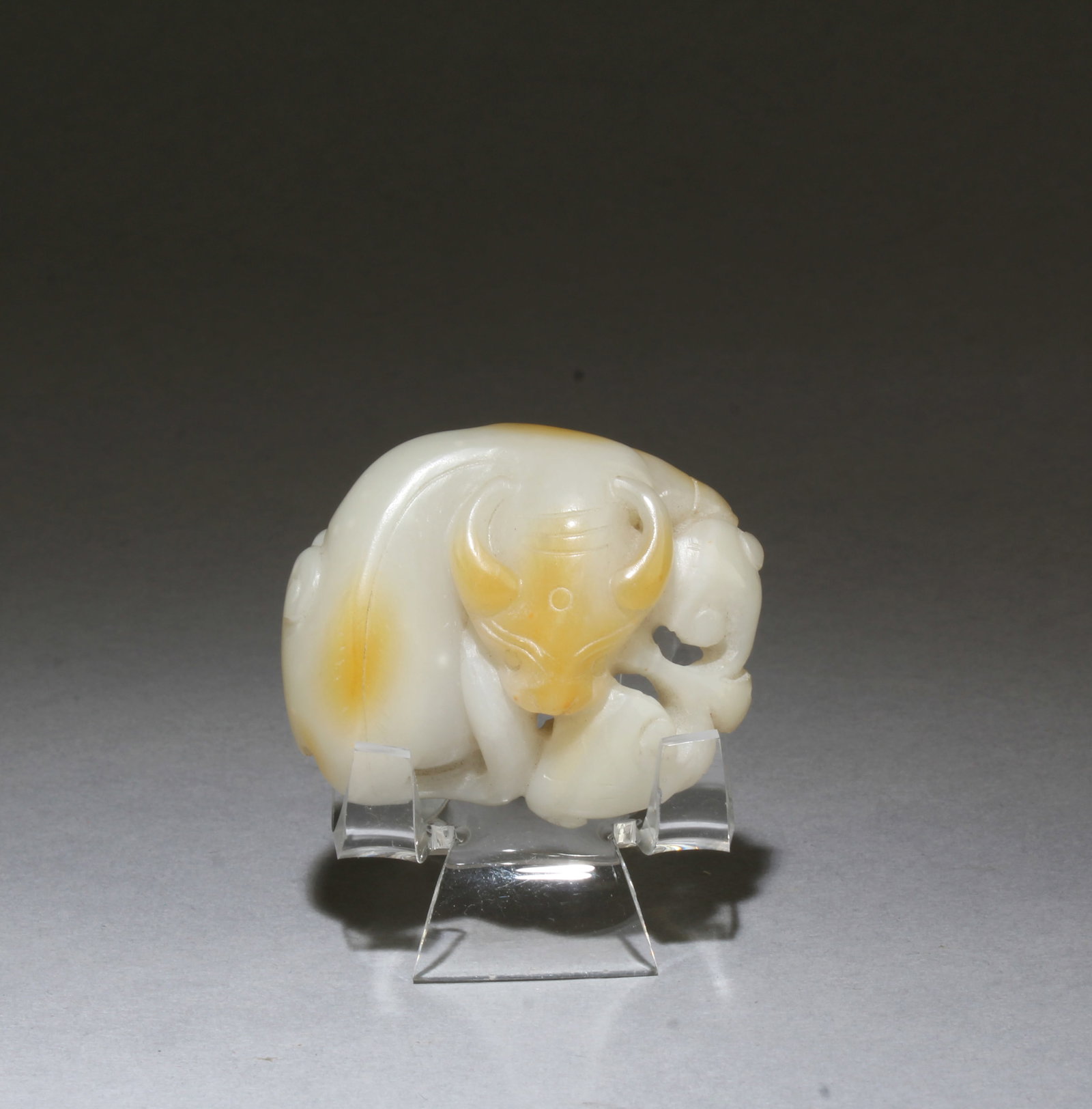A Carved Jade Ornament: A Carved Jade Ornament. Length: 2"