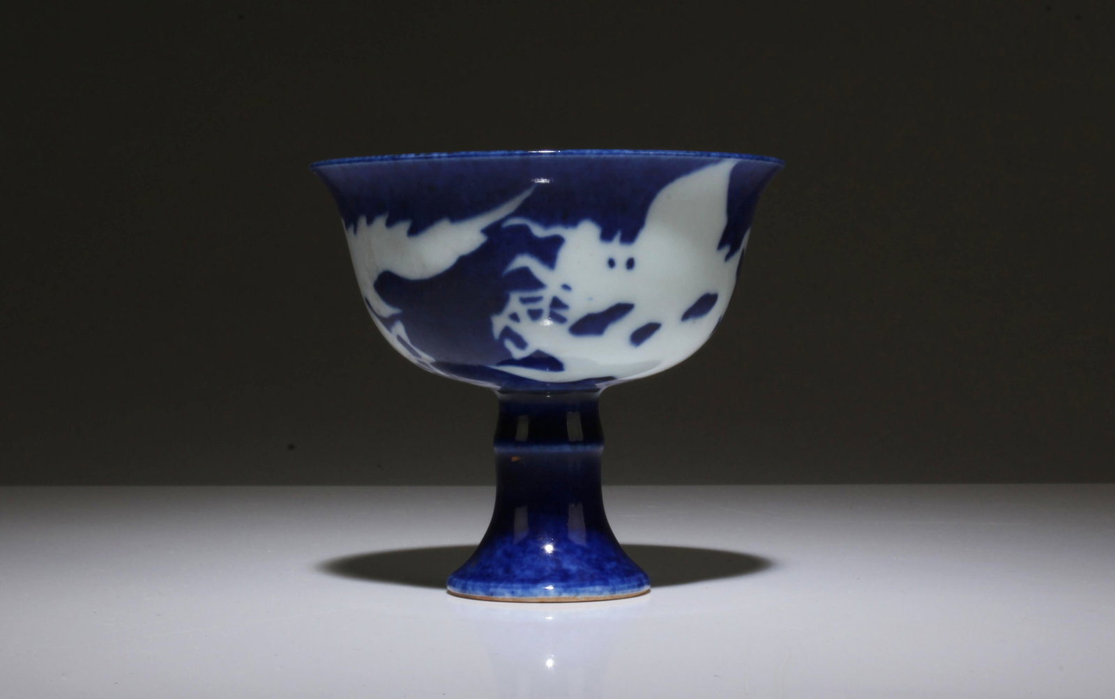 A Blue and White Ceremonial Cup: A Blue and White Ceremonial Cup. Dimensions: 3.45" x 3.1".