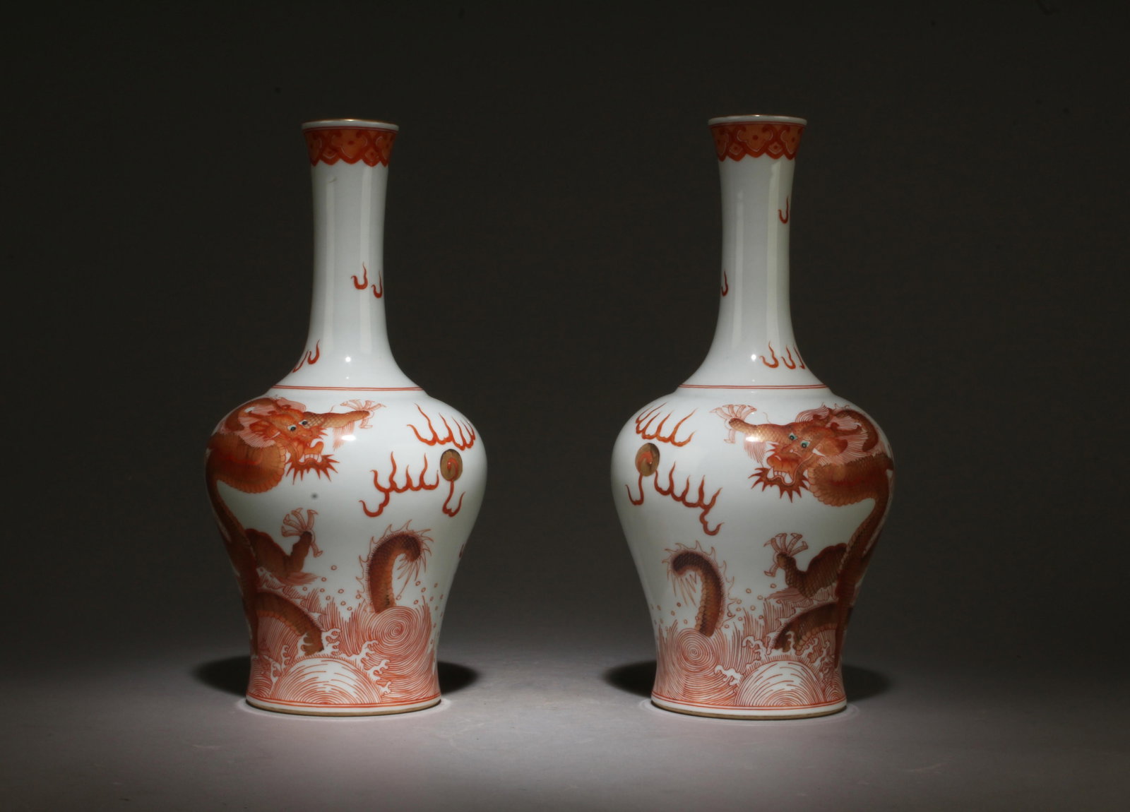 A Pair of Dragon and Koi Design Vases: A Pair of Dragon and Koi Design Vases with "Qianlong" mark at base. Dimensions: 10" x 5".