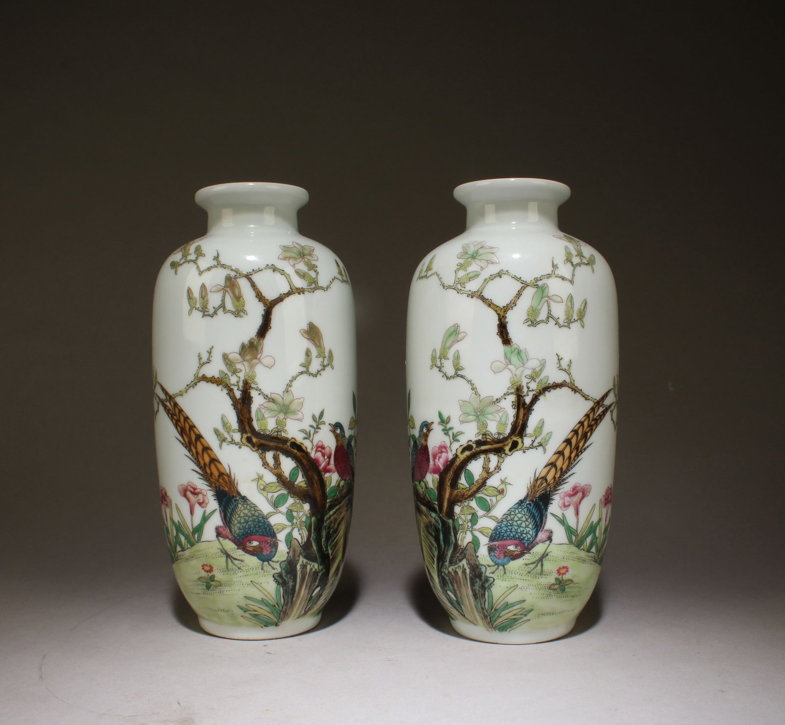 A Pair of Chinese Famille Rose Vase: A Pair of Chinese Famille Rose Vase. Dimensions: 8.2" x 3.5".