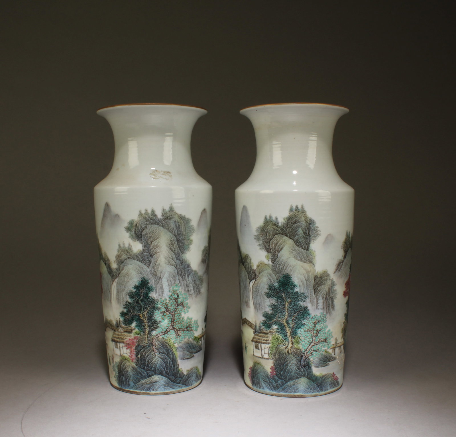 A Pair of Famille Rose Porcelain Vase: A Pair of Famille Rose Porcelain Vase. Dimensions: 9.75" x 4.3".