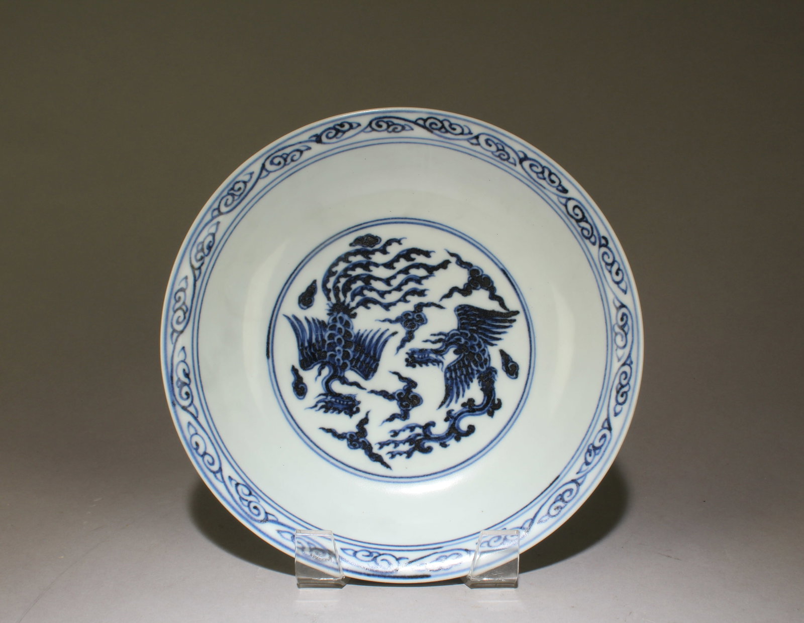 A Blue and White Plate: A Blue and White Plate. Dimensions: 8" x 2".