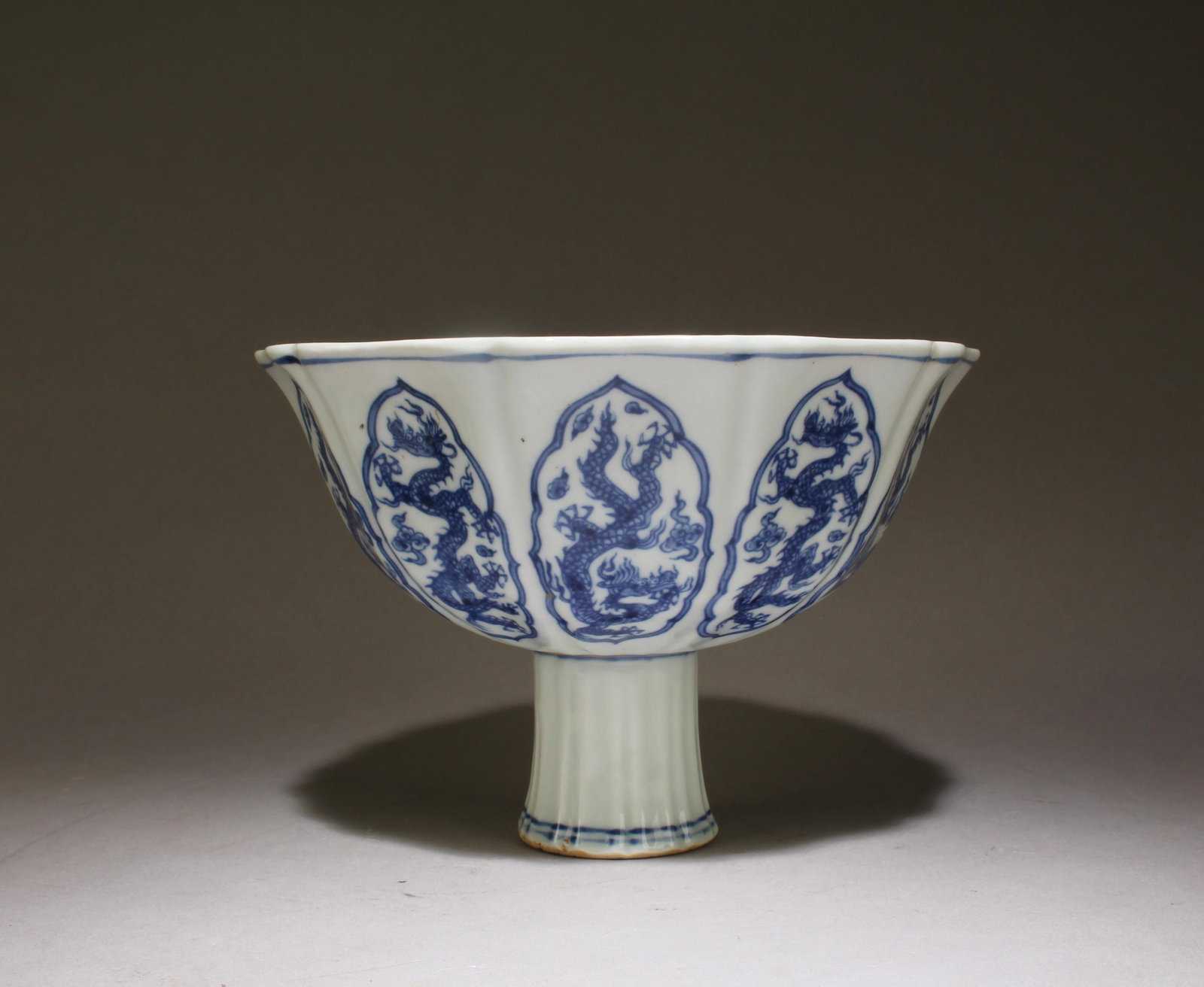 A Blue and White Ceremonial Bowl: A Blue and White Ceremonial Bowl. Dimensions: 4.5" x 6.75".