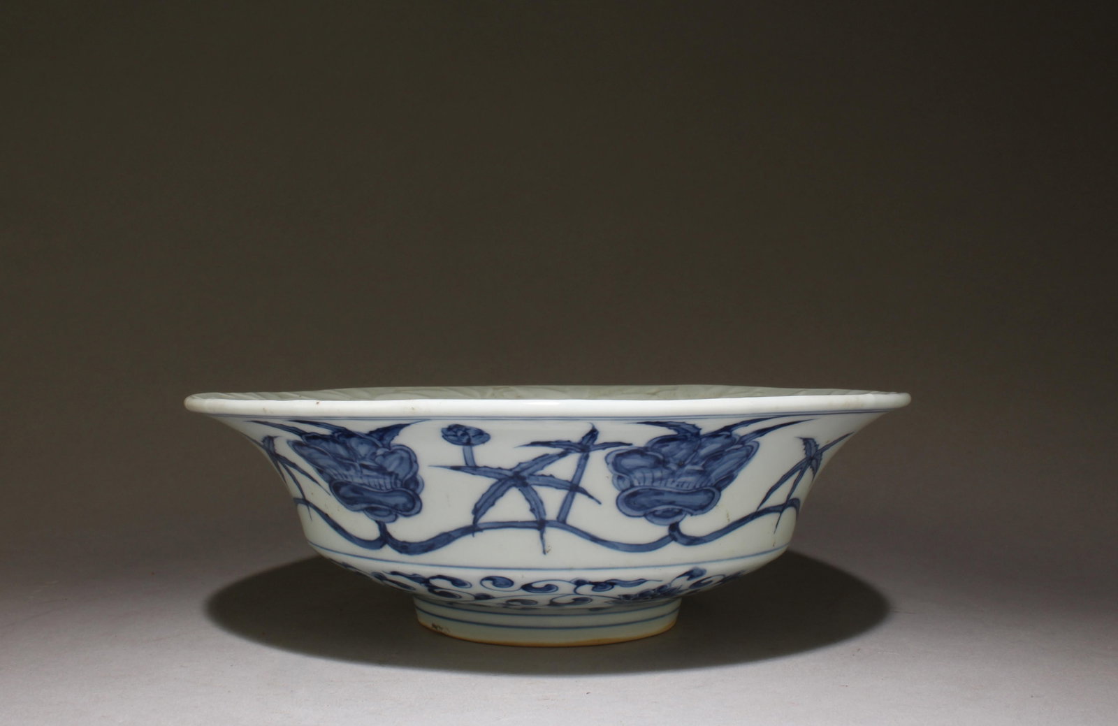 A Blue and White Soup Plate: A Blue and White Soup Plate. Dimensions: 8" x 2.5".