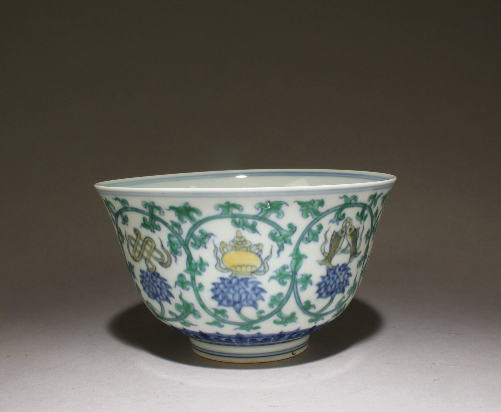 A Doucai Floral Pattern Bowl: A Doucai Floral Pattern Bowl. Dimensions: 6" x 3.5".