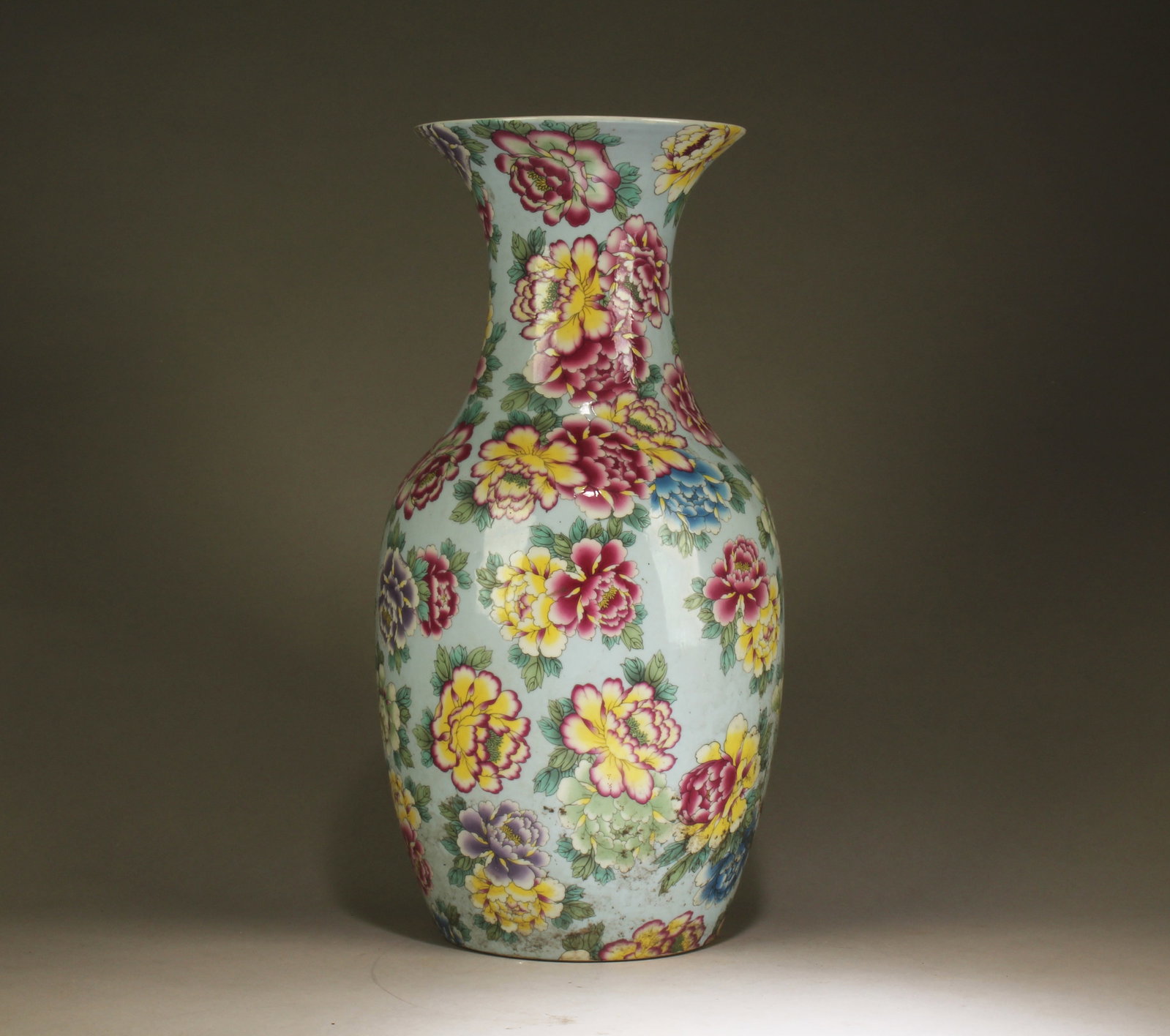 A Famille Rose Vase with Flower Motif: A Famille Rose Vase with Flower Motif. Dimensions: 17" x 8".