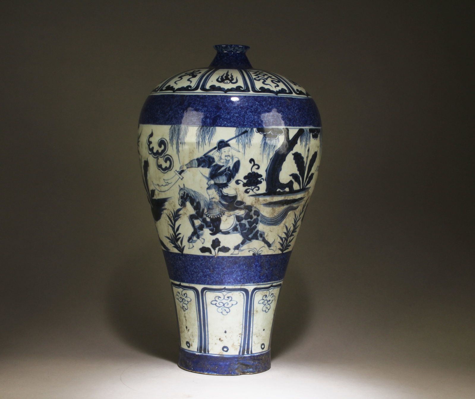 A Blue and White Meiping Vase with Powder Blue: A Blue and White Meiping Vase with Powder Blue. Dimensions: 18.25" x 10.25".