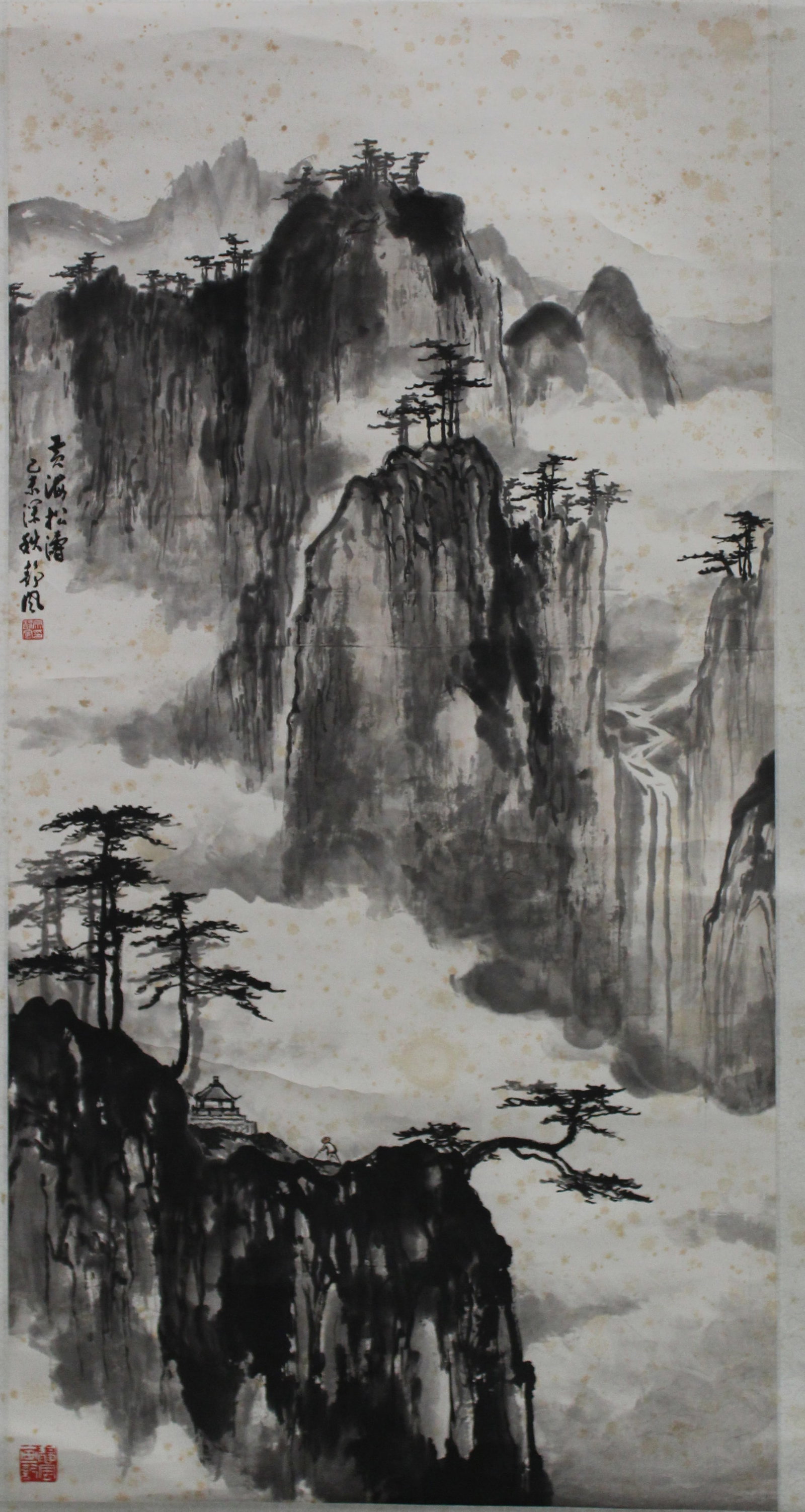 A Chinese Hanging Scroll Painting: Chinese Hanging Scroll Painting, ink and color on paper,a landscape painting of the pine trees and mysterious canyon surrounded by the mountains, attributed to Zong Jingfeng with two red seal marks.He