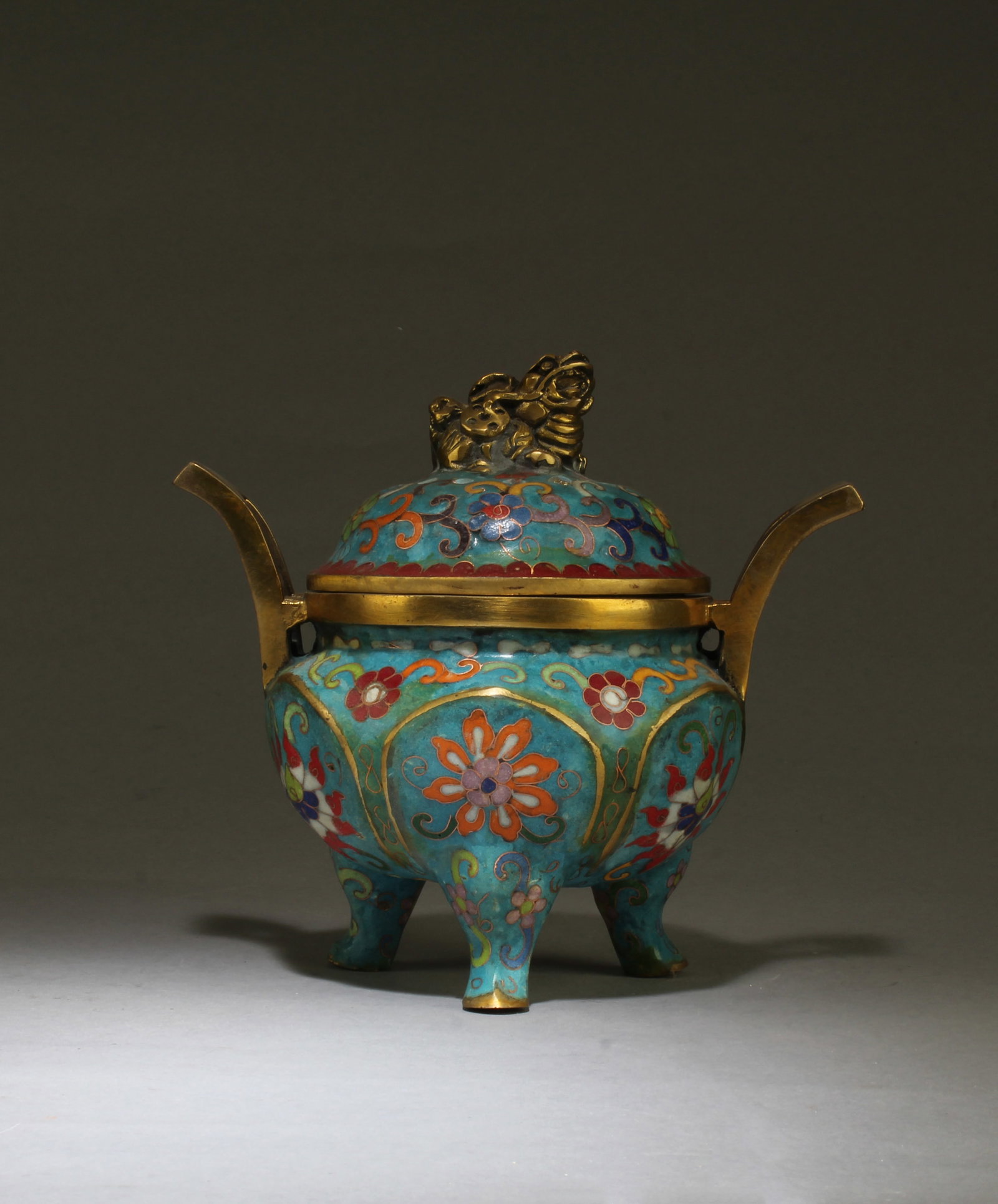 Chinese Cloisonne Censer: Chinese Cloisonne Tripod Censer, flanked by two handles. A four character mark is imprinted at the base. Height: 6.5"