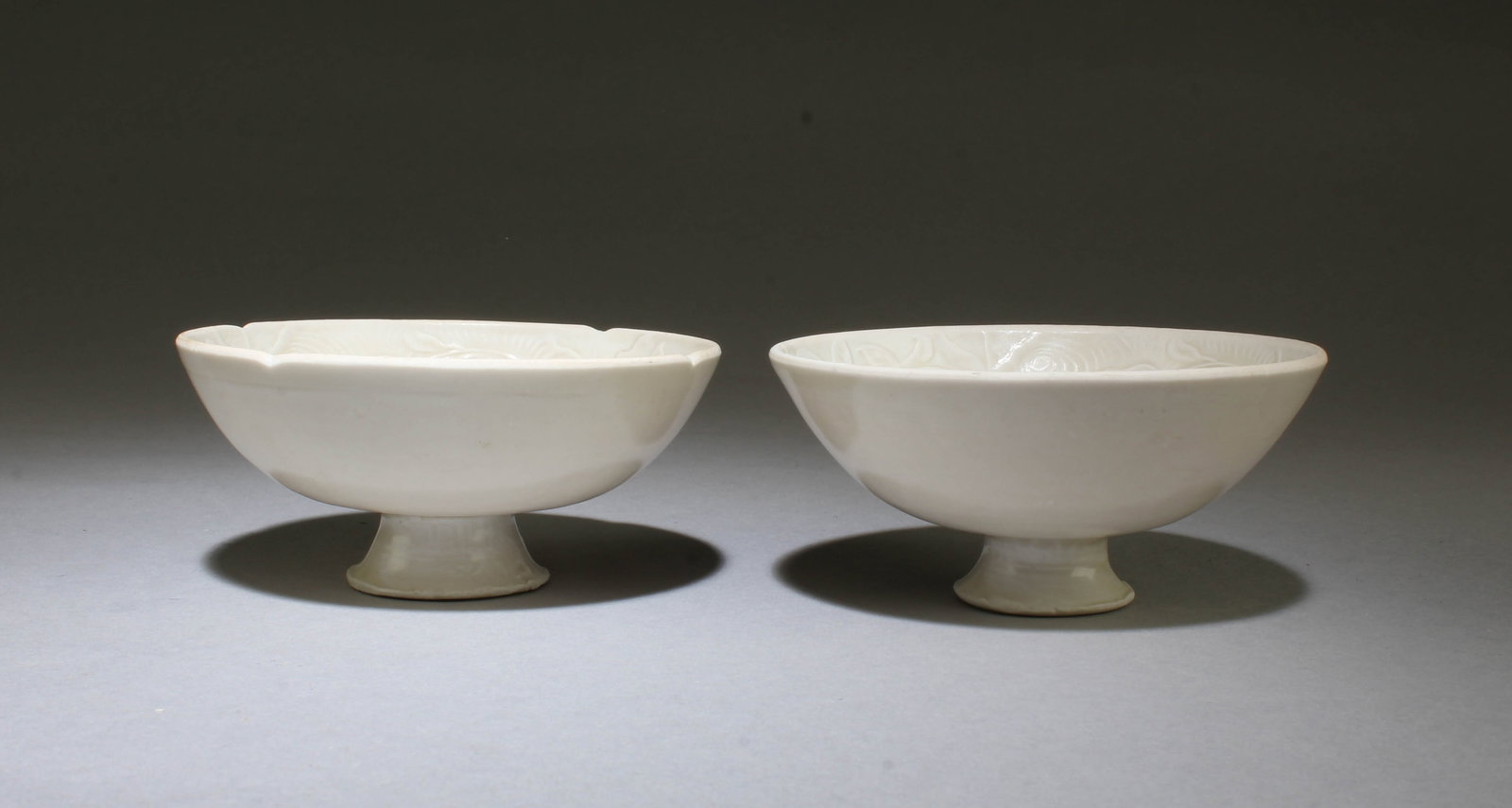 A Group of Two Monochrome Porcelain Cups: A Group of Two Porcelain Cups. Diameter: 3.5", 3.75"