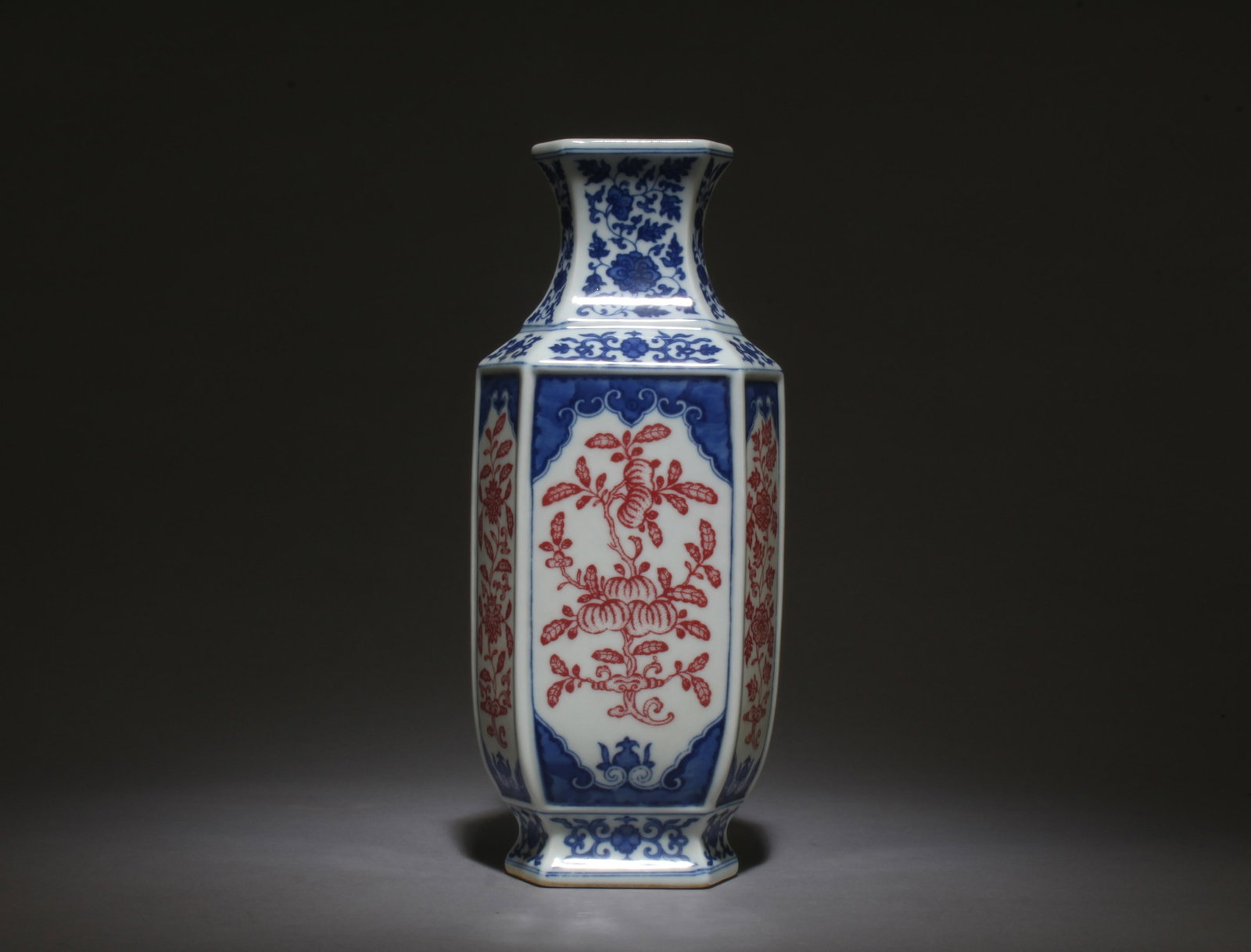 A Blue and Red Vase: A Blue and Red Vase. Dimensions: 9.5" x 4" x 2.75".