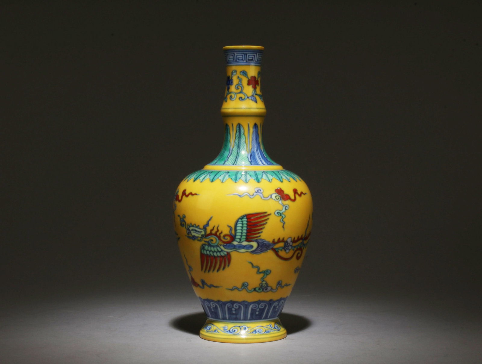 A Multi-Colored Vase: A Multi-Colored Vase. Dimensions: 9.5" x 4.5".