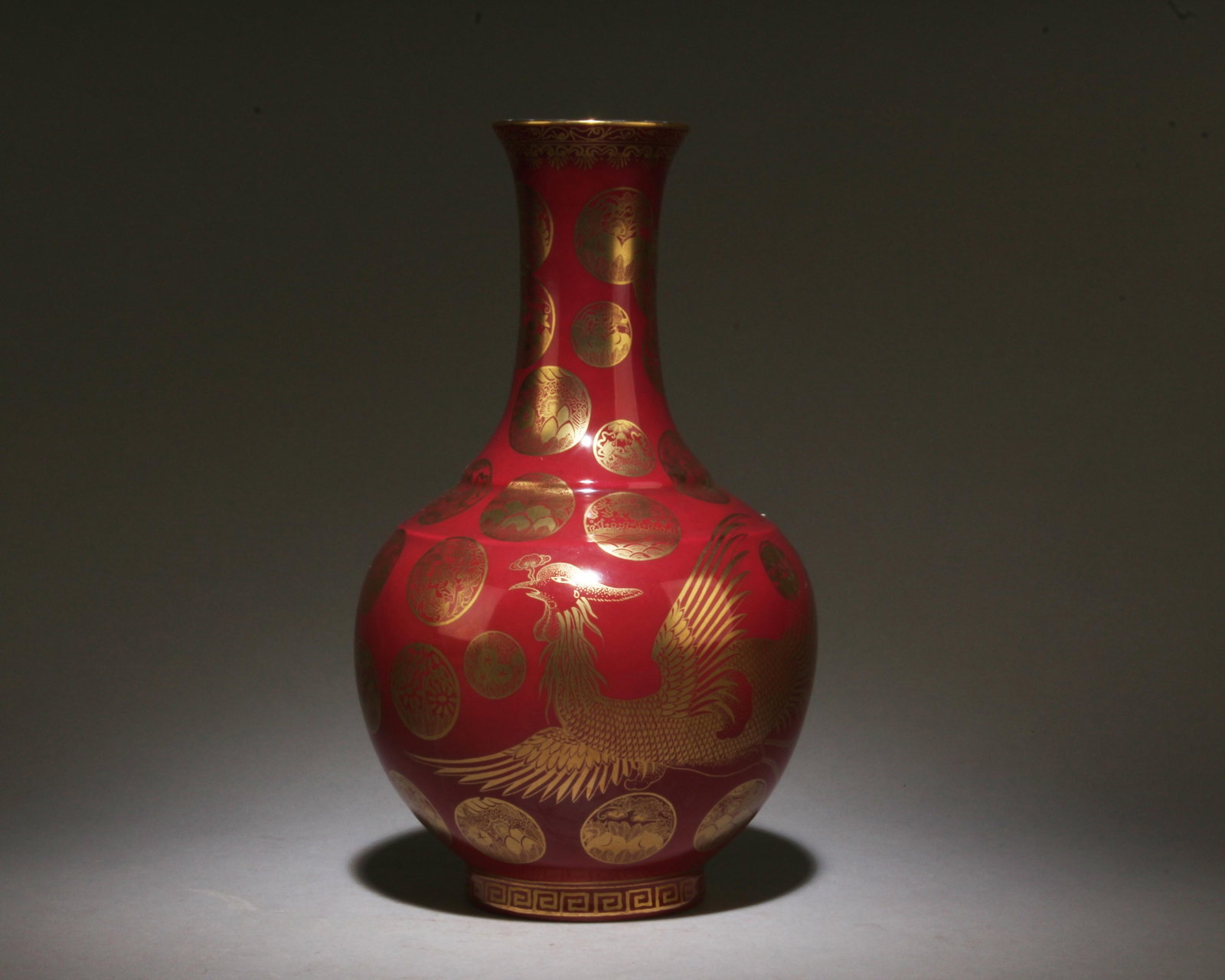 A Red and Gold Phoenix Vase: A Red and Gold Phoenix Vase. Dimensions: 9" x 5.2".