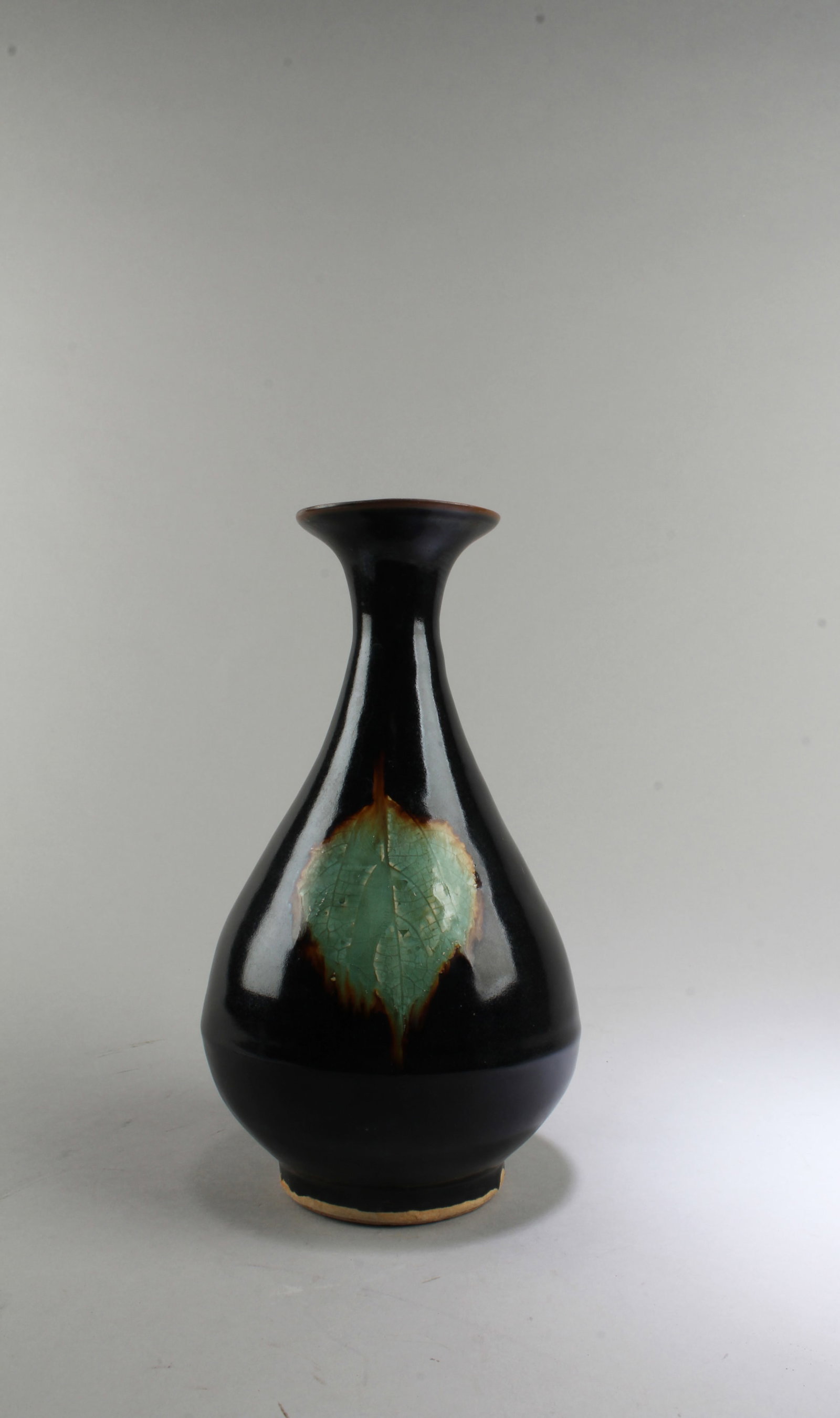 Chinese Porcelain Vase: Chinese Porcelain Vase, base unglazed. Height: 10"