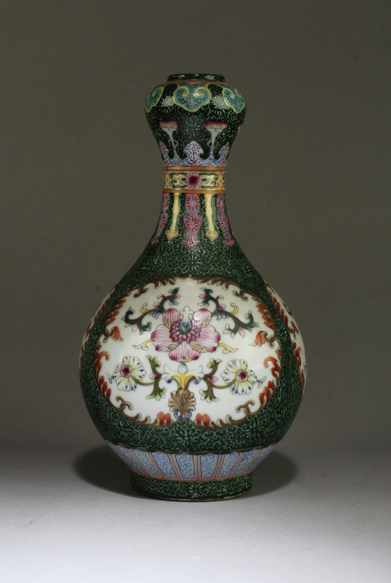Chinese Famille Verte Porcelain Vase: Chinese Famille Verte Porcelain Vase. 'QianLong' mark at base. Height: 9"