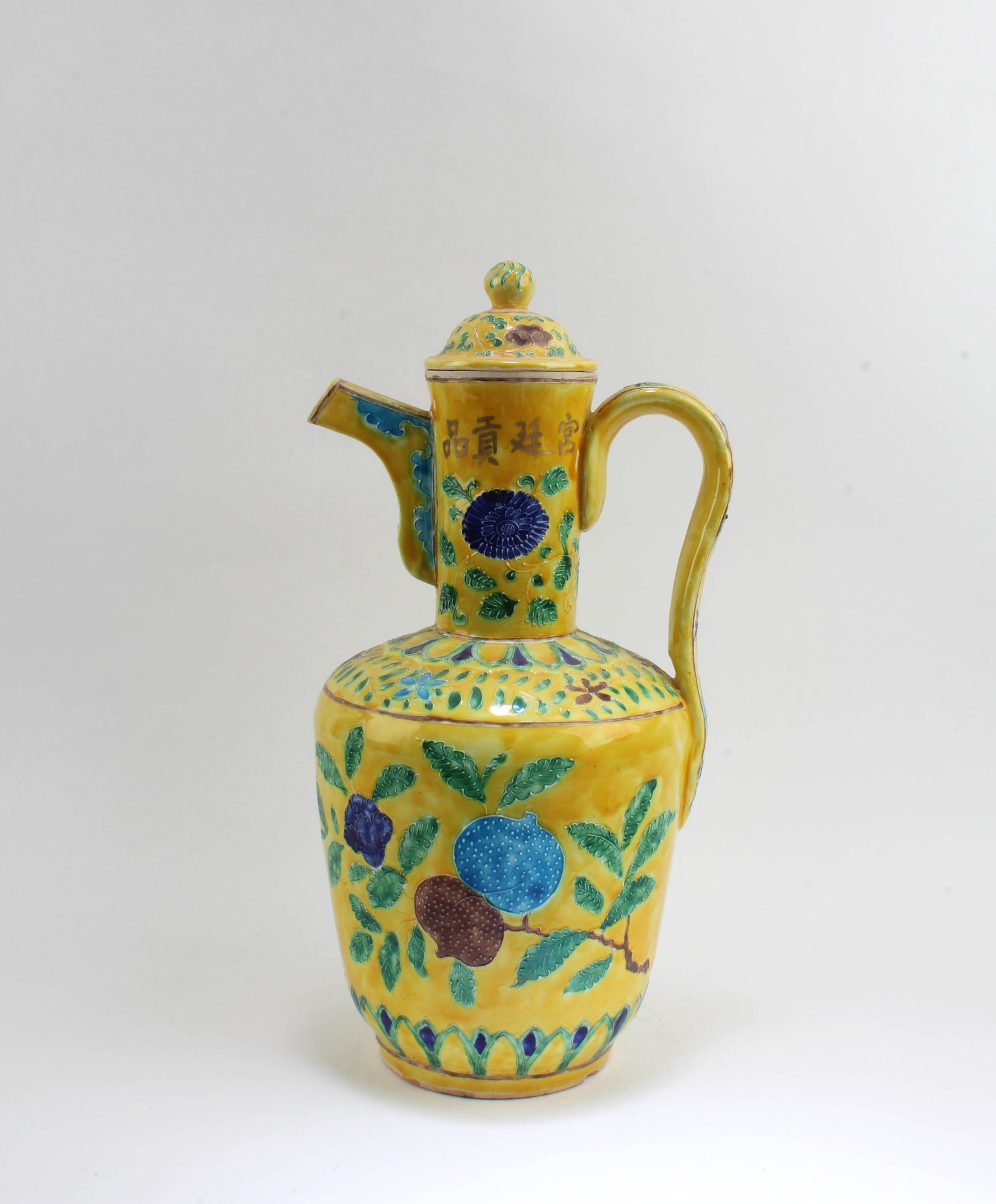 Chinese Famille Jaune Porcelain Teapot: Chinese Famille Jaune Porcelain Teapot. 'Gong ting Gong Pins' on body. Height: 13"