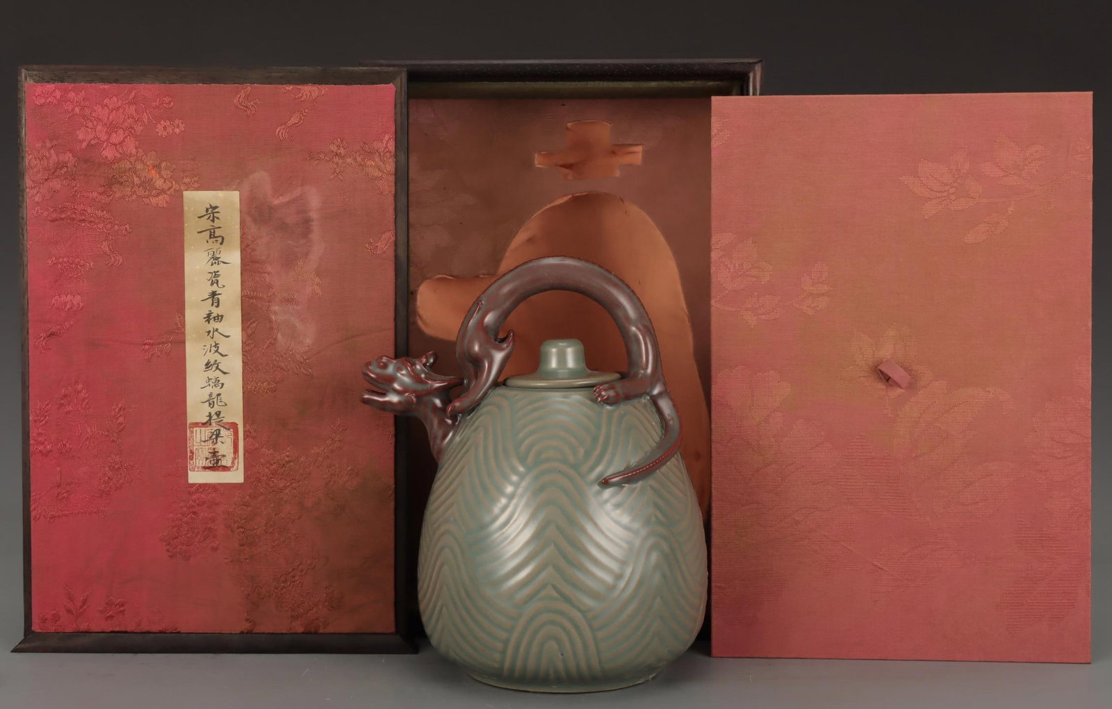 A Goryeo Celadon Ewer: A Goryeo Celadon Ewer. Height: 9.25" Width: 6.89"
