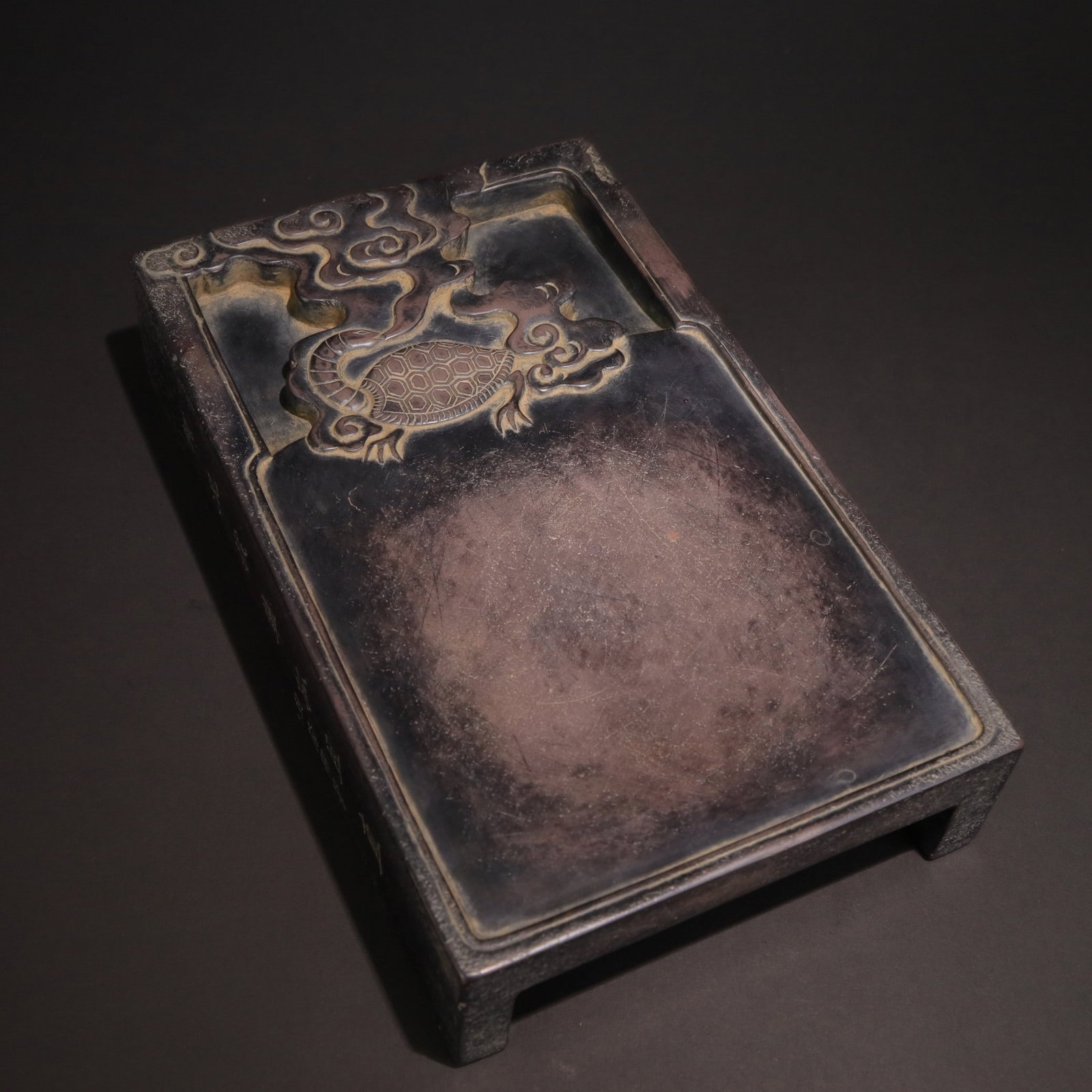 A Duan Inkstone with Imperial Inscription: A Duan Inkstone with Imperial Inscription. Dimensions: 8.27" x 5.12" x 1.77". Weight: 3.90lbs.