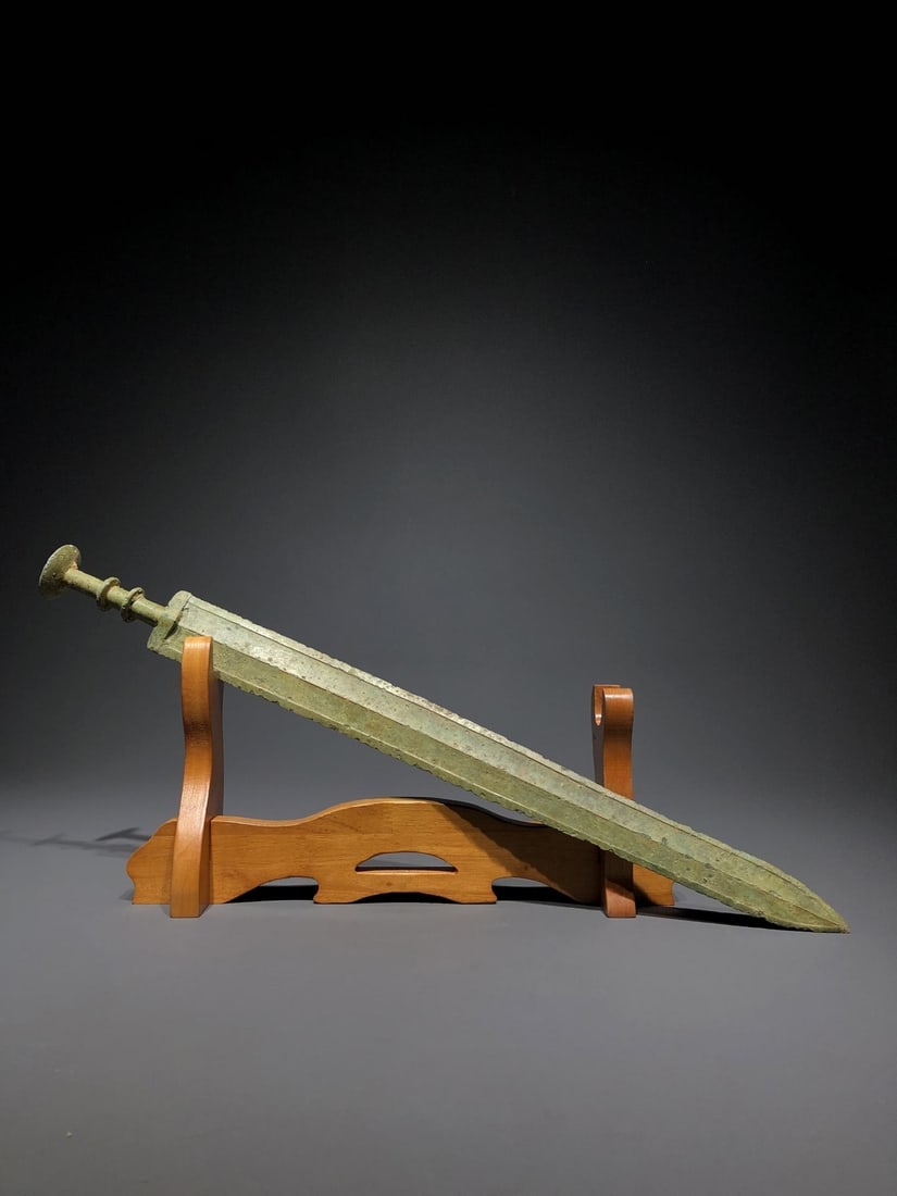 A Warring States Composite Sword: A Warring States Composite Sword. Dimensions: 22.05" x 1.77". Weight: 1.76lbs.