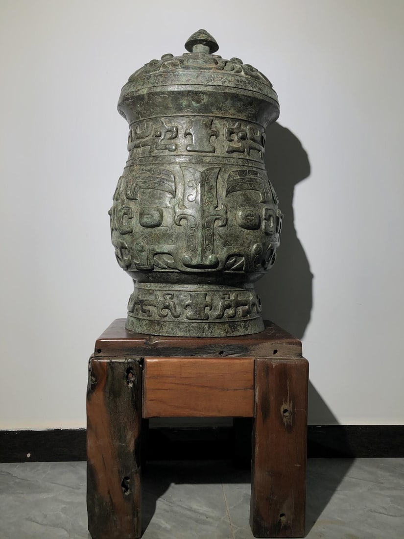 A Bronze Ritual Cup: A Bronze Ritual Cup. Dimensions: 15.75" x 13.78" x 29.13". Weight: 104.72lbs.