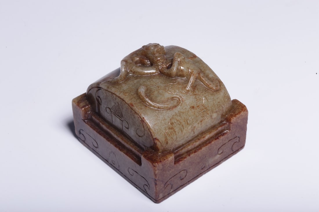 An Archaic Jade Seal: An Archaic Jade Seal. Dimensions: 2.09" x 2.05" x 1.97". Weight: 0.56lbs.
