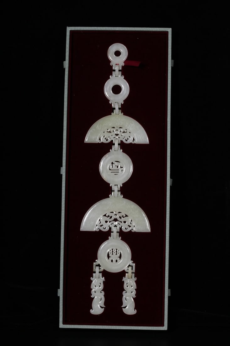 A Hetian Jade Pendant Set: A Hetian Jade Pendant Set. Dimensions: 20.35" x 5.20" x 0.20". Weight: 0.89lbs.