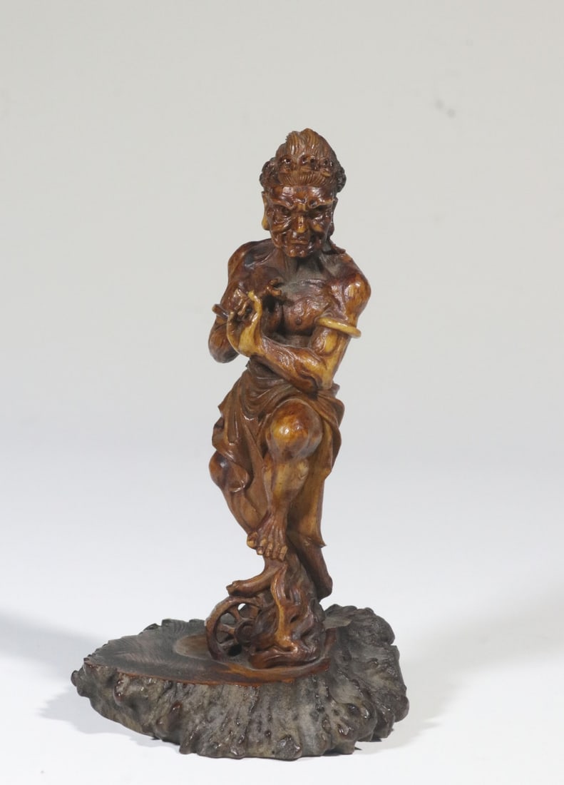 An Antler Carved Fudo Myo?o Statue: An Antler Carved Fudo Myo?o Statue. Height: 5.28"; Length: 3.15"; Width: 3.07". Weight: 0.38lbs.