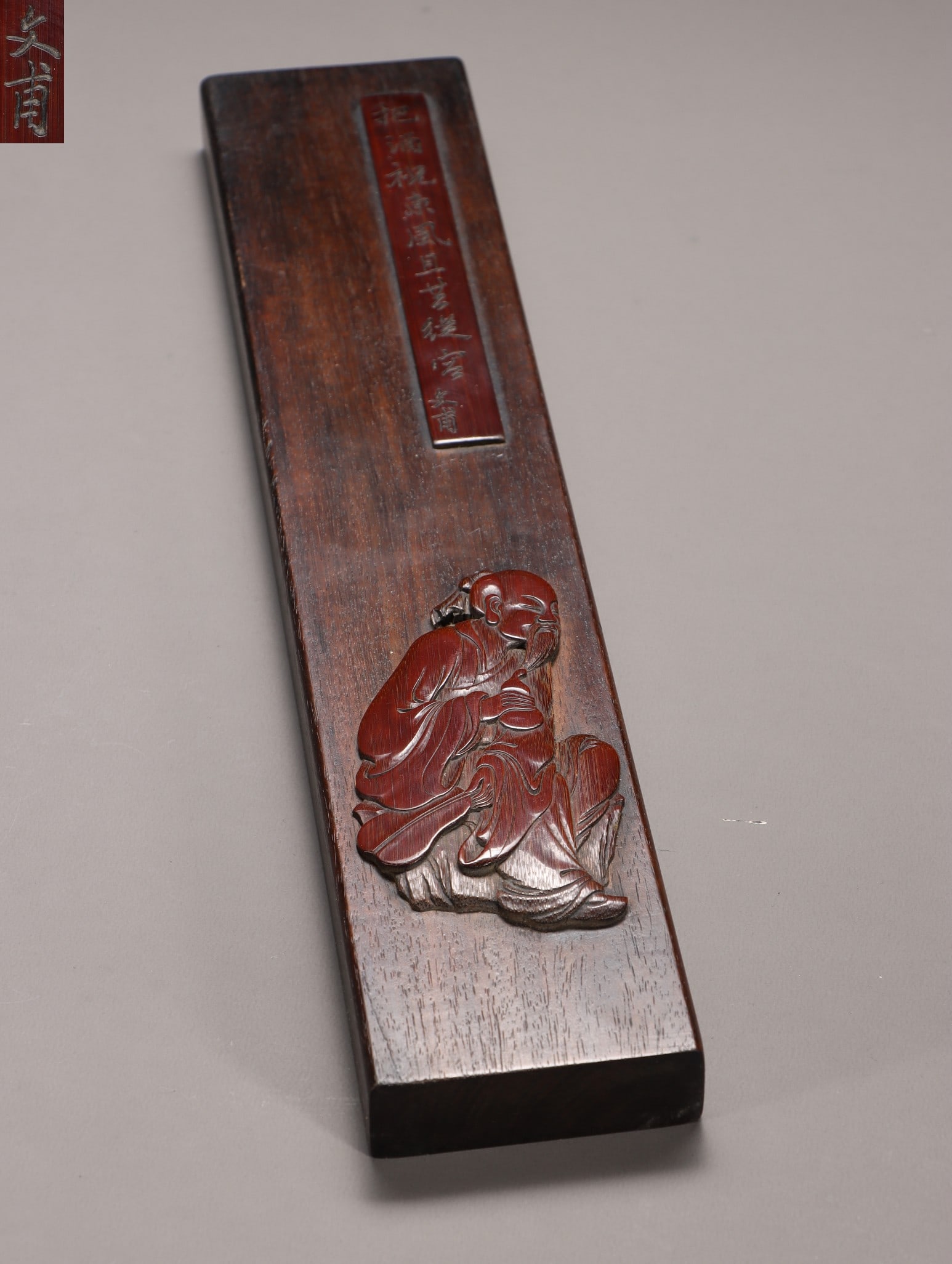A Hardwood and Bamboo Paperweight: A Hardwood and Bamboo Paperweight. Thickness: 0.91"; Length: 11.81"; Width: 2.36". Weight: 0.77lbs.