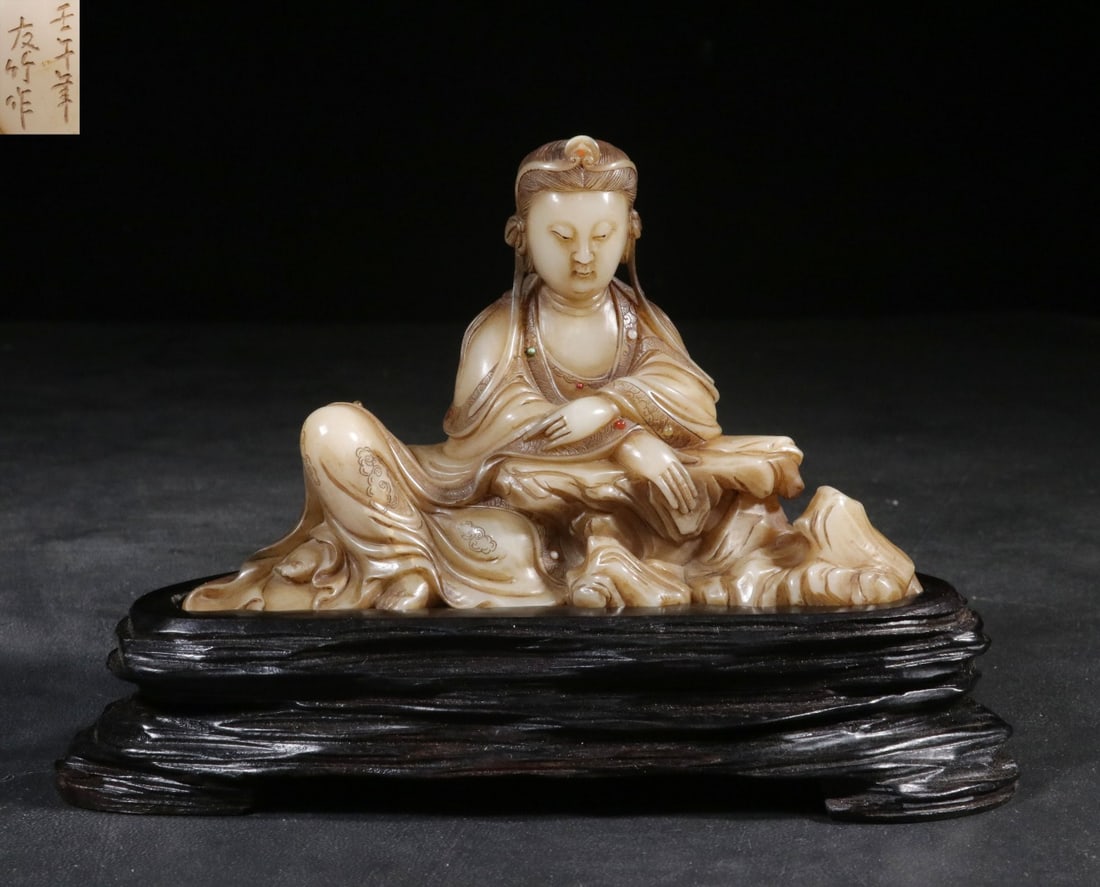 A Shoushan Stone Guanyin Statue: A Shoushan Stone Guanyin Statue. Height: 4.96"; Length: 5.91"; Width: 2.36". Weight: 1.01lbs.