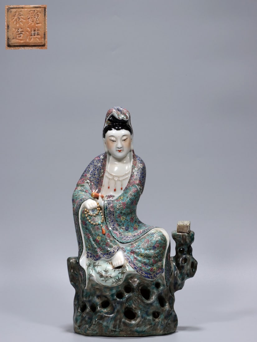 A Fencai Enamel Guanyin Statue: A Fencai Enamel Guanyin Statue. Height: 12.80"; Length: 7.48"; Width: 4.92"; Diameter: 5.71". Weight: 2.85lbs.