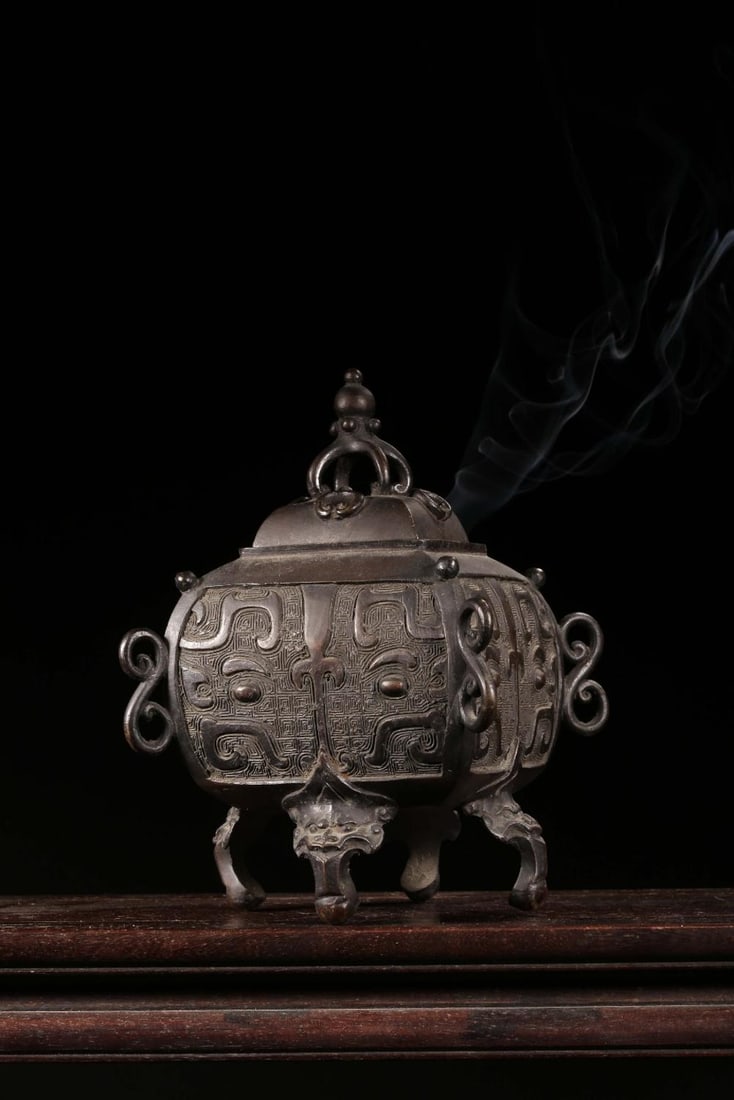 A Bronze Censer: A Bronze Censer. Height: 7.09"; Length: 4.41"; Width: 4.41". Weight: 2.30lbs.
