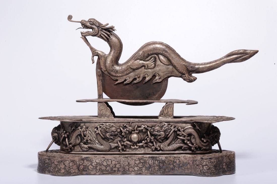 A Silver Medicine Cutter: A Silver Medicine Cutter. Height: 10.63"; Length: 14.96"; Width: 4.53". Weight: 4.32lbs.