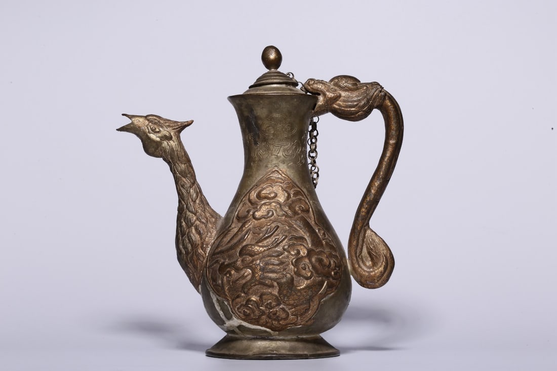 A Gilt Bronze Ewer: A Gilt Bronze Ewer. Height: 6.89"; Length: 6.30"; Diameter: 3.35". Weight: 0.49lbs.